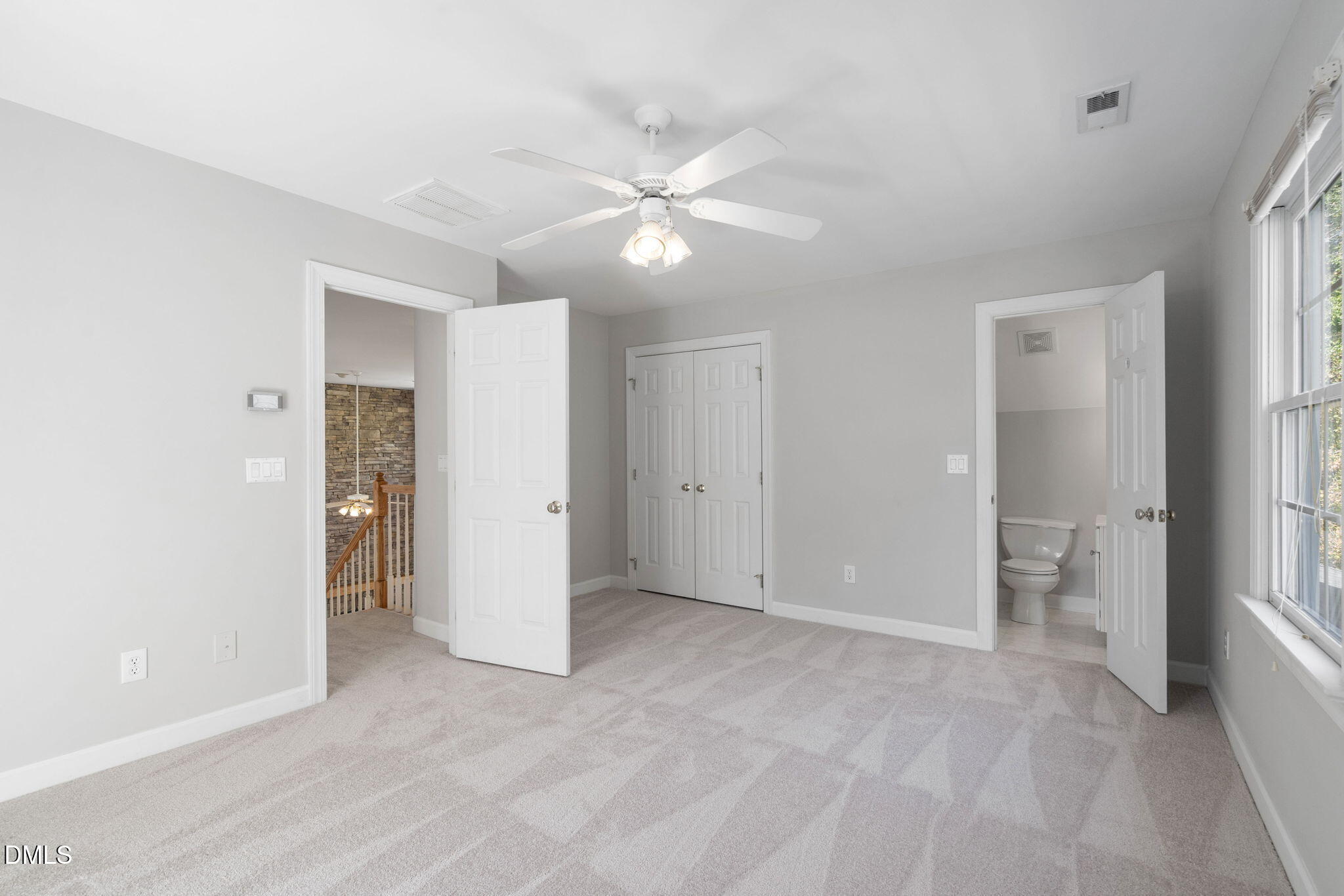 9916 Bonsal Crossing Road New Hill, NC 27562 - Photo 40 of 80 a view of an empty room with a bathroom
