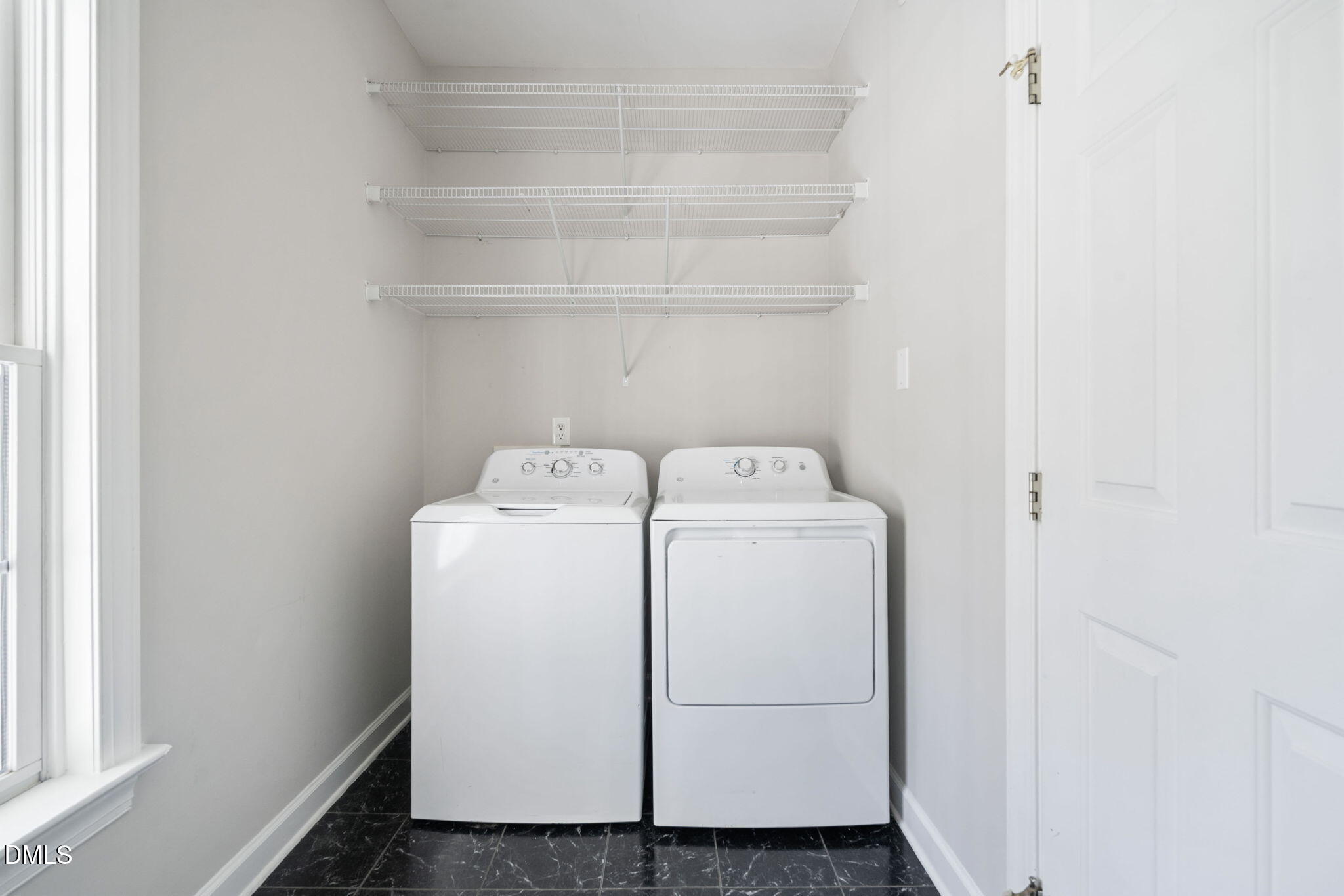 9916 Bonsal Crossing Road New Hill, NC 27562 - Photo 48 of 80 a utility room with dryer and washer