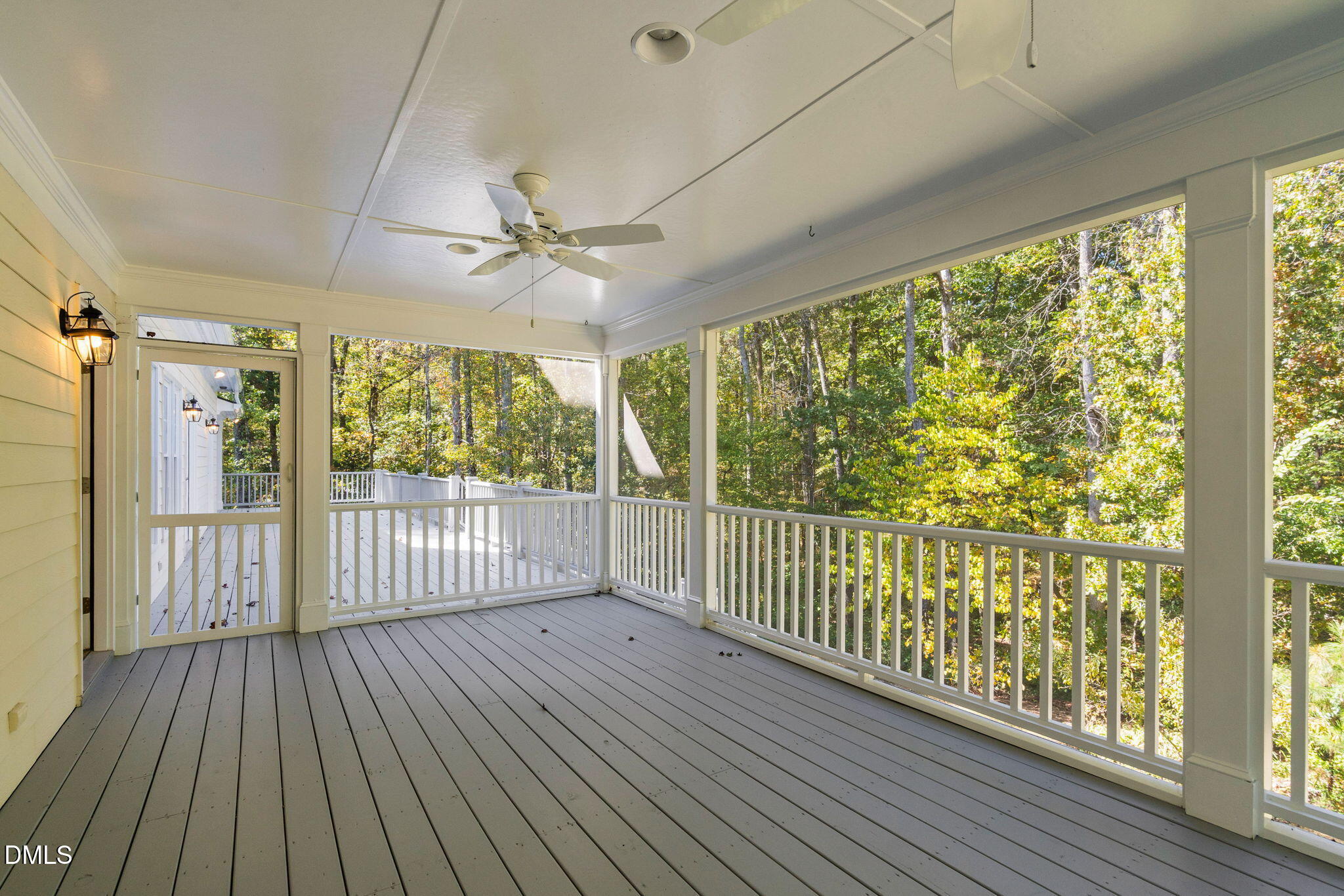 9916 Bonsal Crossing Road New Hill, NC 27562 - Photo 52 of 80 a view of a porch with wooden floor