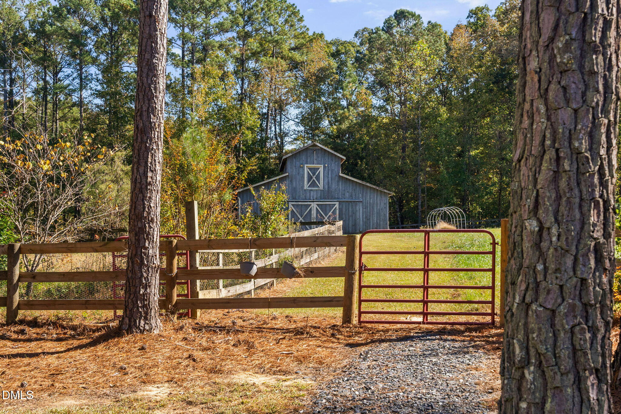 9916 Bonsal Crossing Road New Hill, NC 27562 - Photo 60 of 80 a view of a house with a yard