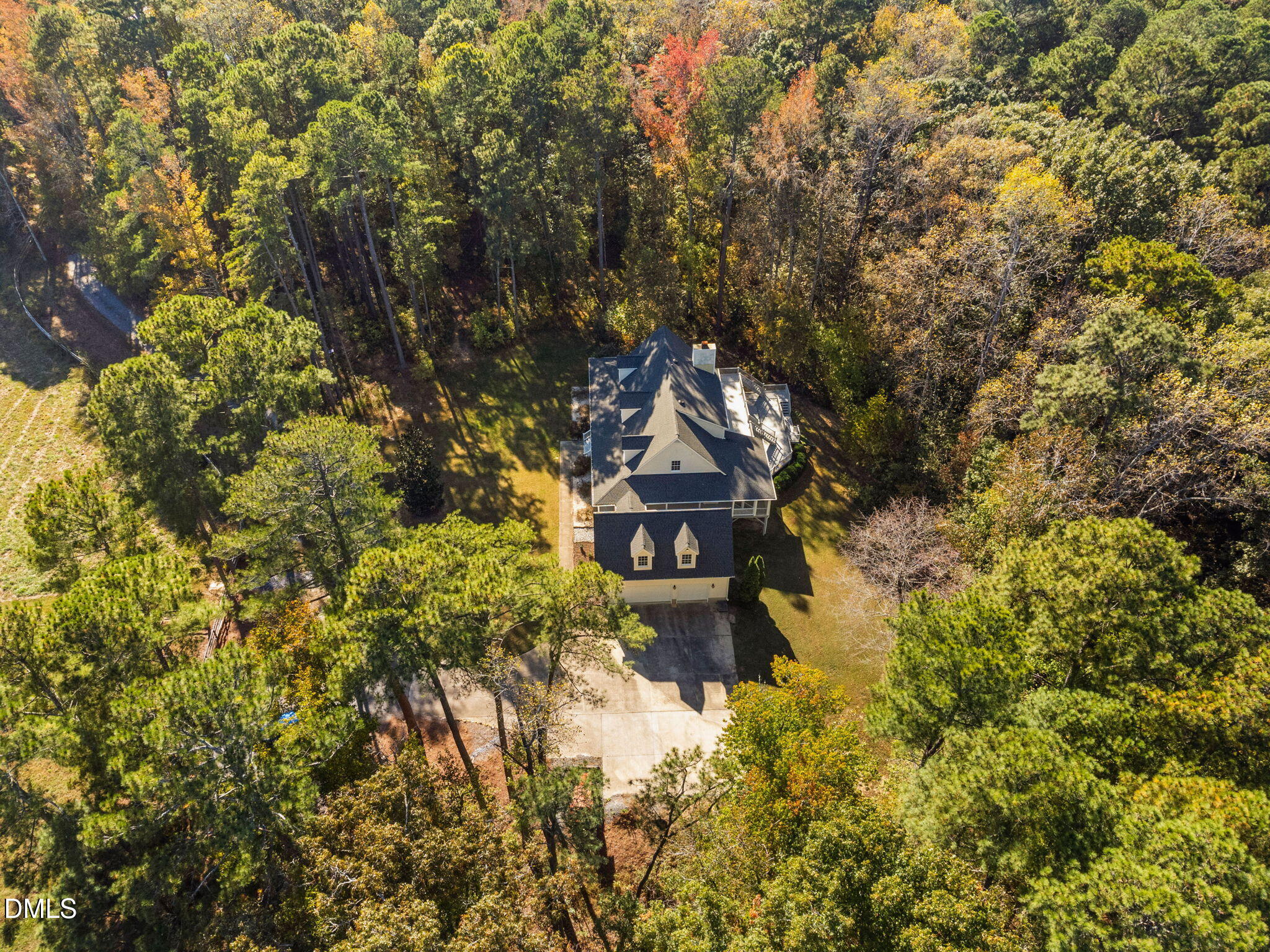 9916 Bonsal Crossing Road New Hill, NC 27562 - Photo 6 of 80 a bird view of a house with a yard
