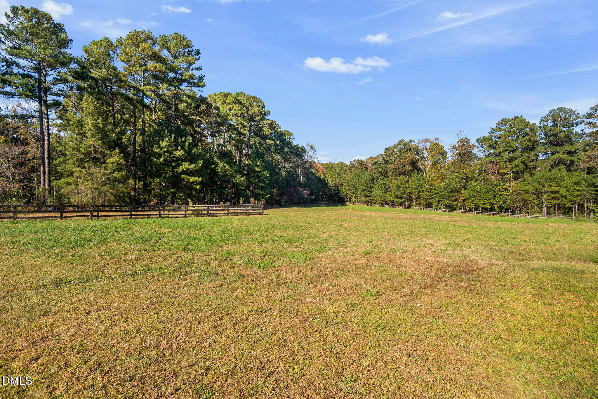 9916 Bonsal Crossing Road New Hill, NC 27562 - Photo 68 of 80 a view of a field with an outdoor space
