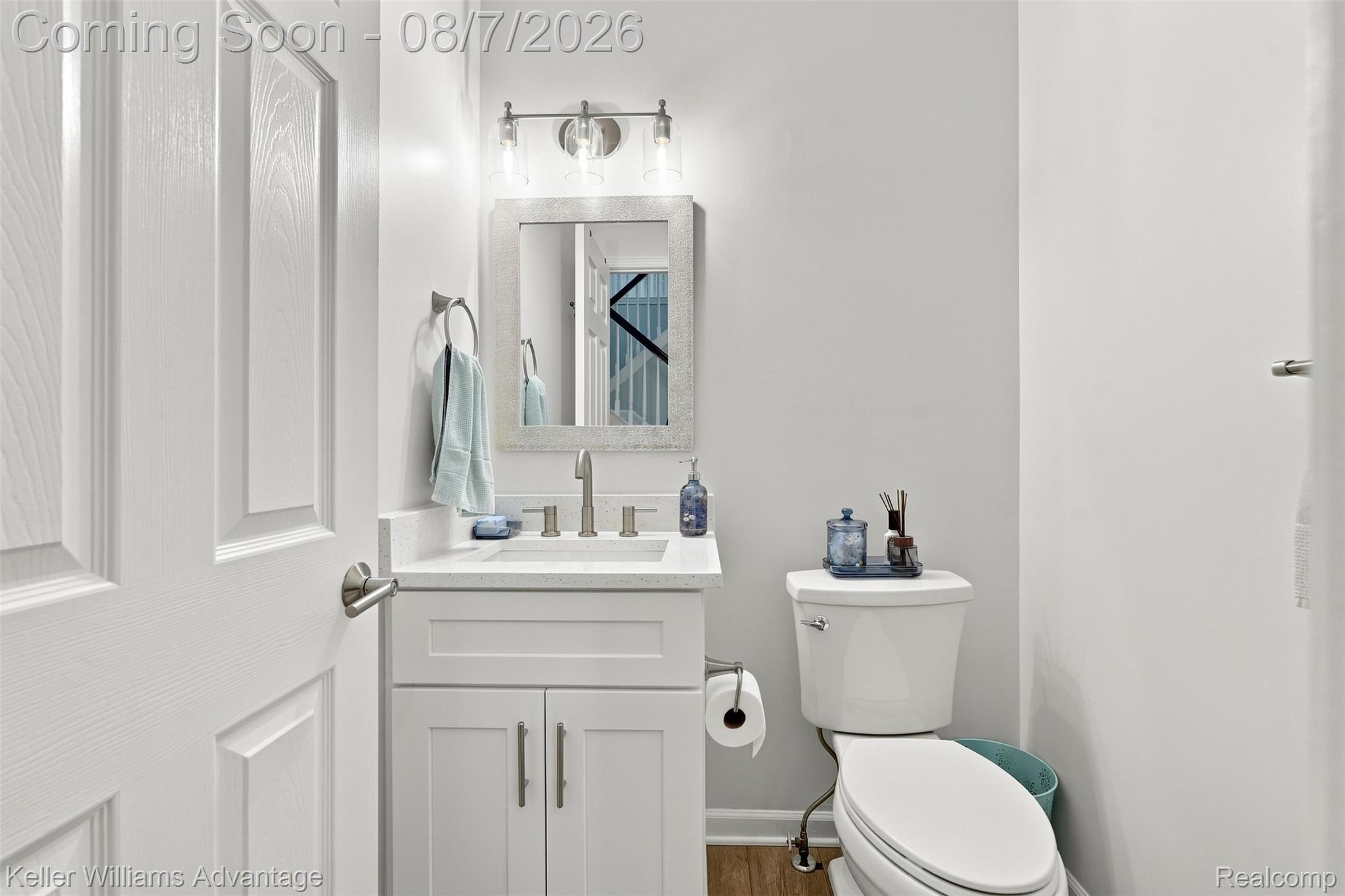 5325 Simpson Lake Road West Bloomfield, MI 48323 - Photo 16 of 43 White shaker-style vanity with a light-toned countertop and an undermount sink