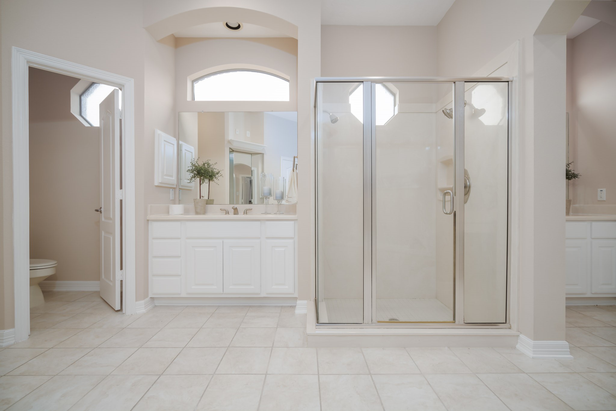 6506 Monte Bello Ridge Lane Houston, TX 77041 - Photo 10 of 39 Indulge in luxury with a sleek stand-up shower and a separate jacuzzi tub, perfect for relaxation and rejuvenation.
