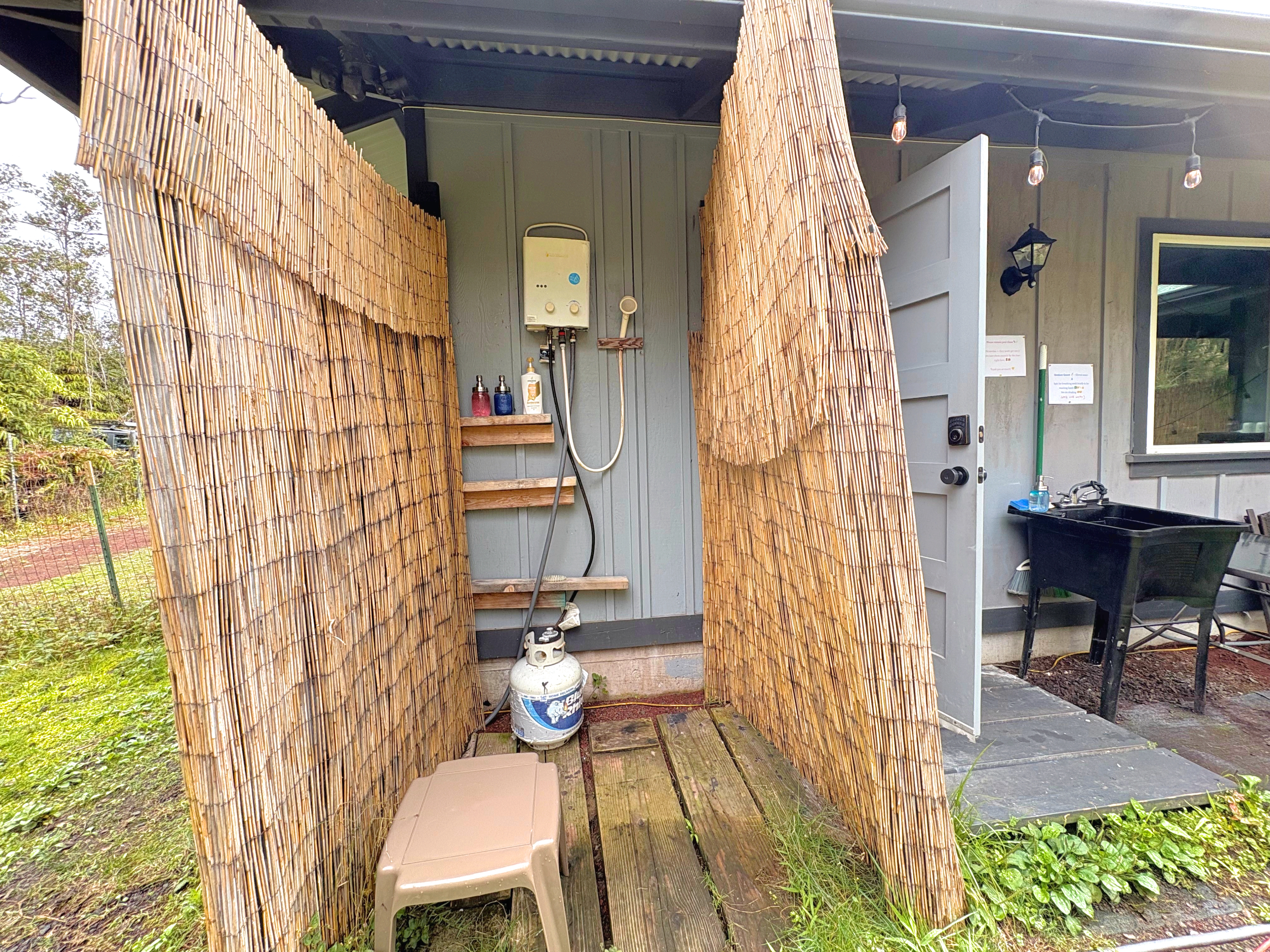11-3083 Kaleponi Road Mountain View, HI 96771 - Photo 21 of 28 a balcony with table and chairs