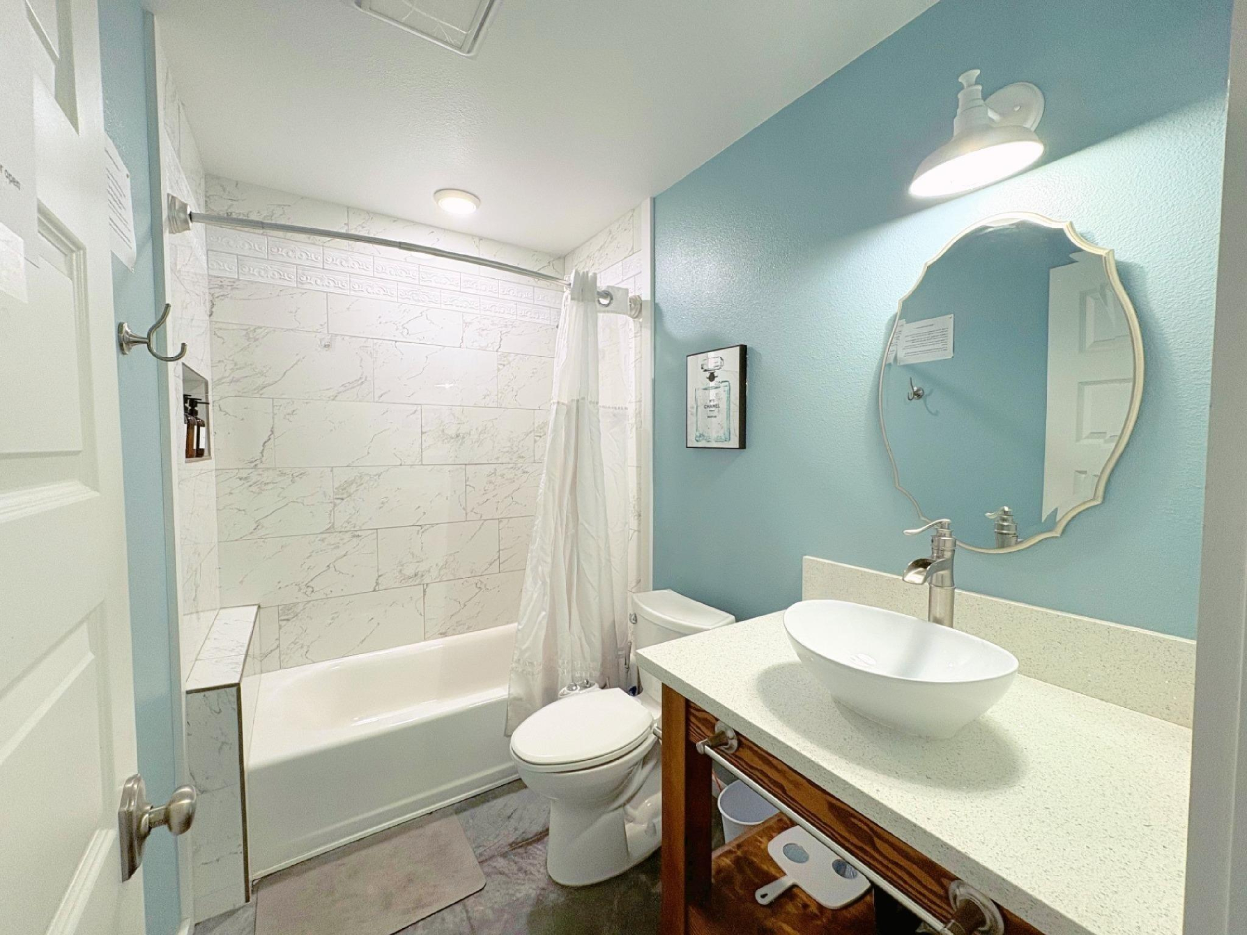 11-3083 Kaleponi Road Mountain View, HI 96771 - Photo 7 of 28 a bathroom with a sink a toilet and shower