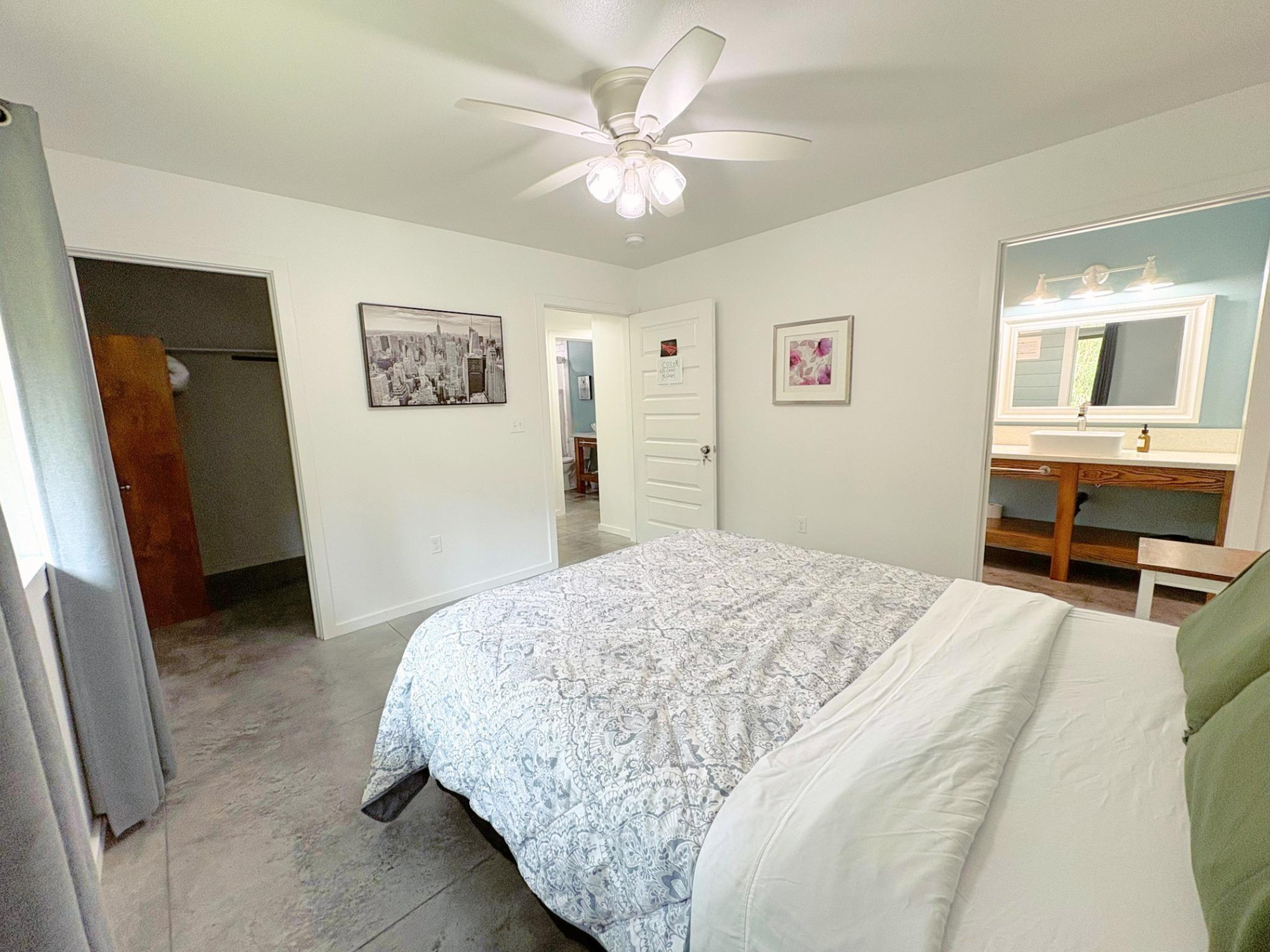 11-3083 Kaleponi Road Mountain View, HI 96771 - Photo 8 of 28 a bedroom with a bed and a dresser