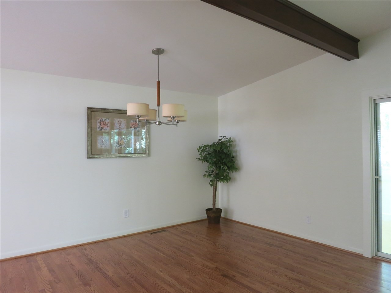 600 Davidson Street Raleigh, NC 27609 - Photo 7 of 25 The vaulted Dining Rm features a modern brushed nickel light fixture. Dining Room