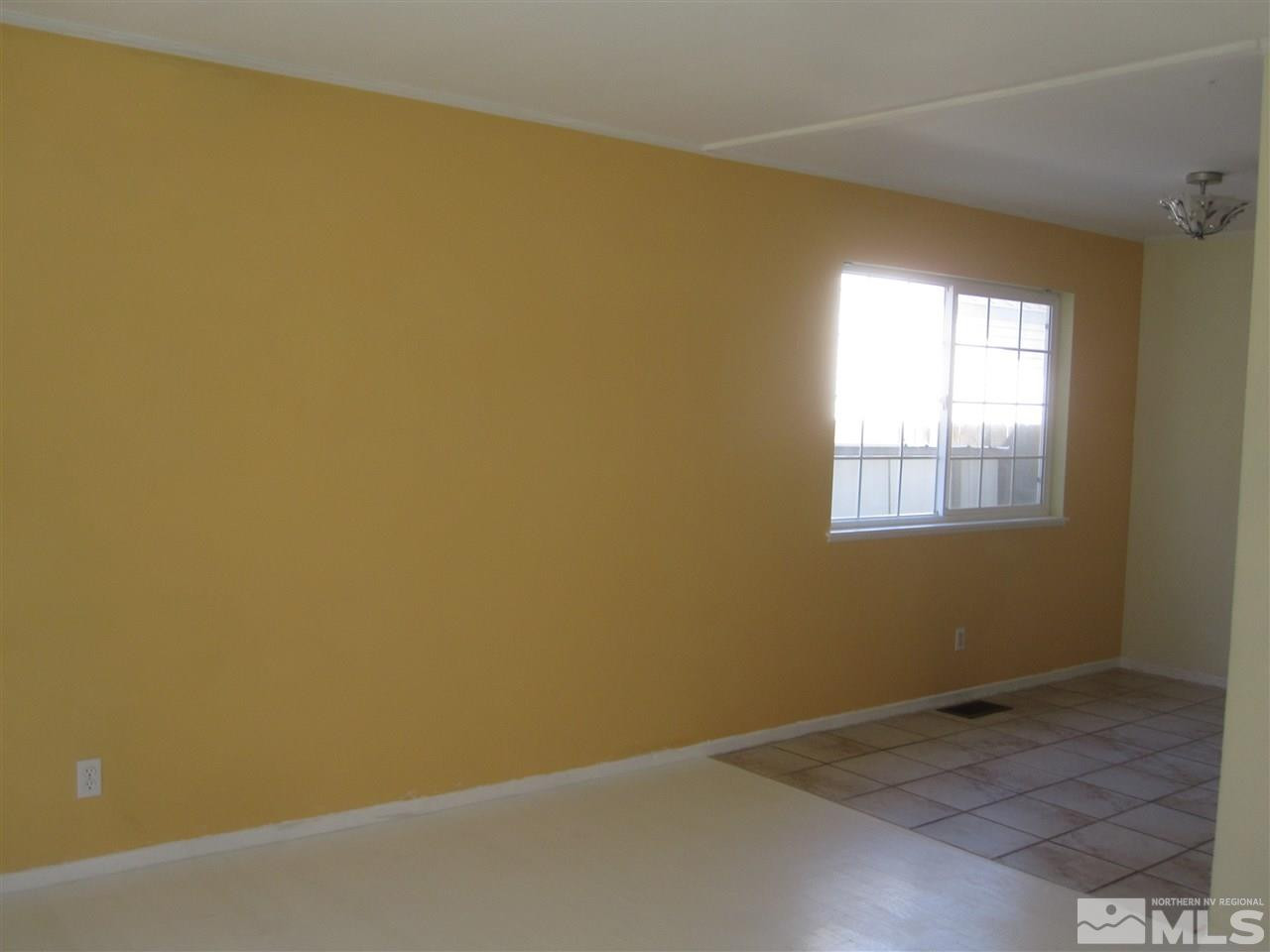 667 Beldon Way Reno, NV 89503 - Photo 6 of 13 an empty room with a window
