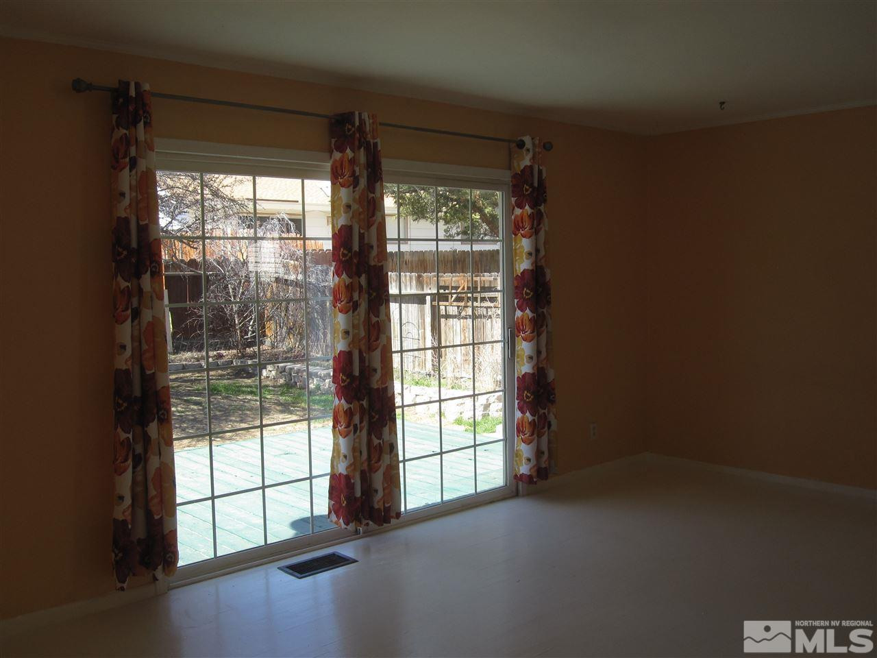 667 Beldon Way Reno, NV 89503 - Photo 7 of 13 a view of empty room with floor to ceiling window