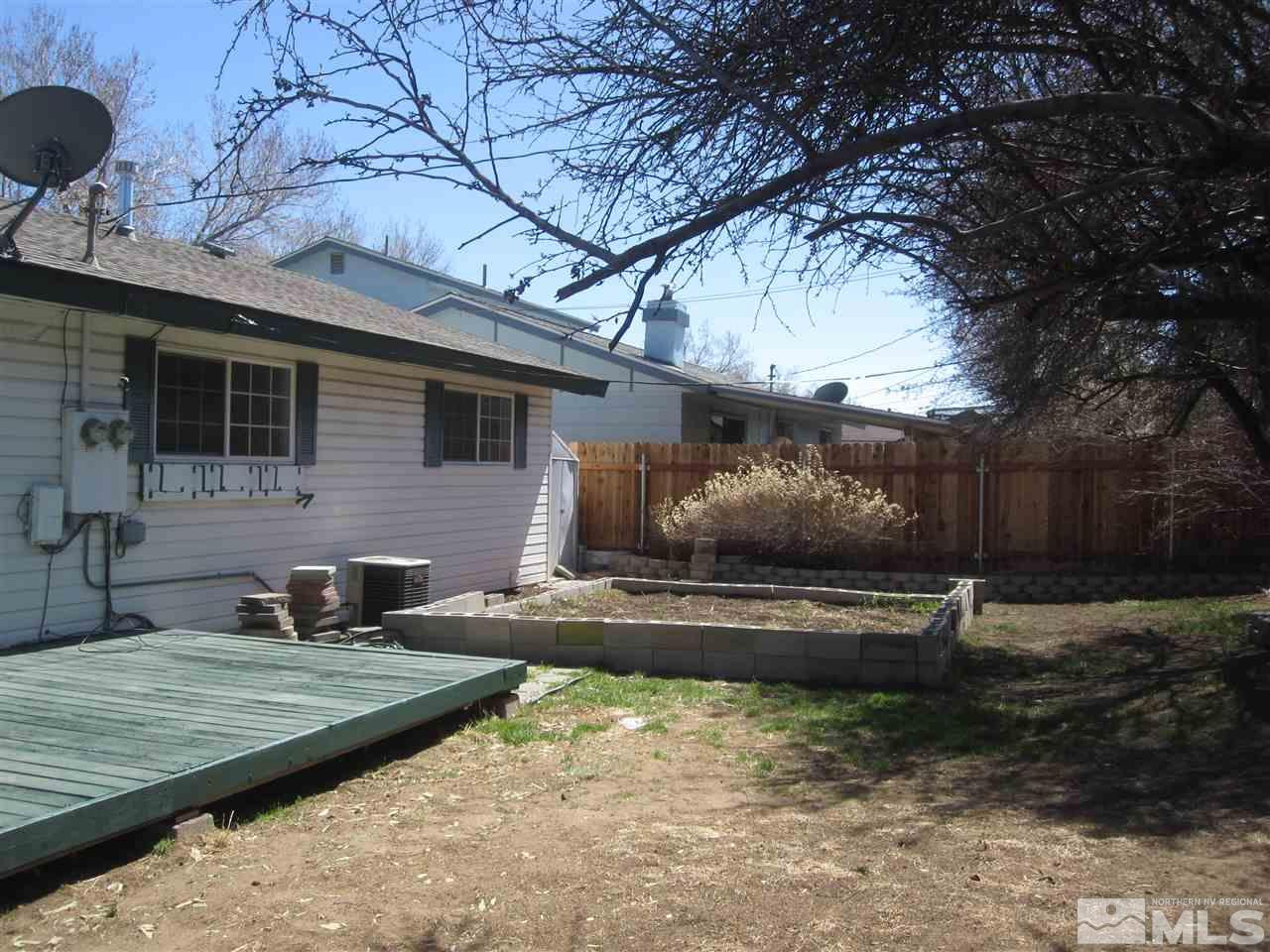 667 Beldon Way Reno, NV 89503 - Photo 10 of 13 a view of house with backyard
