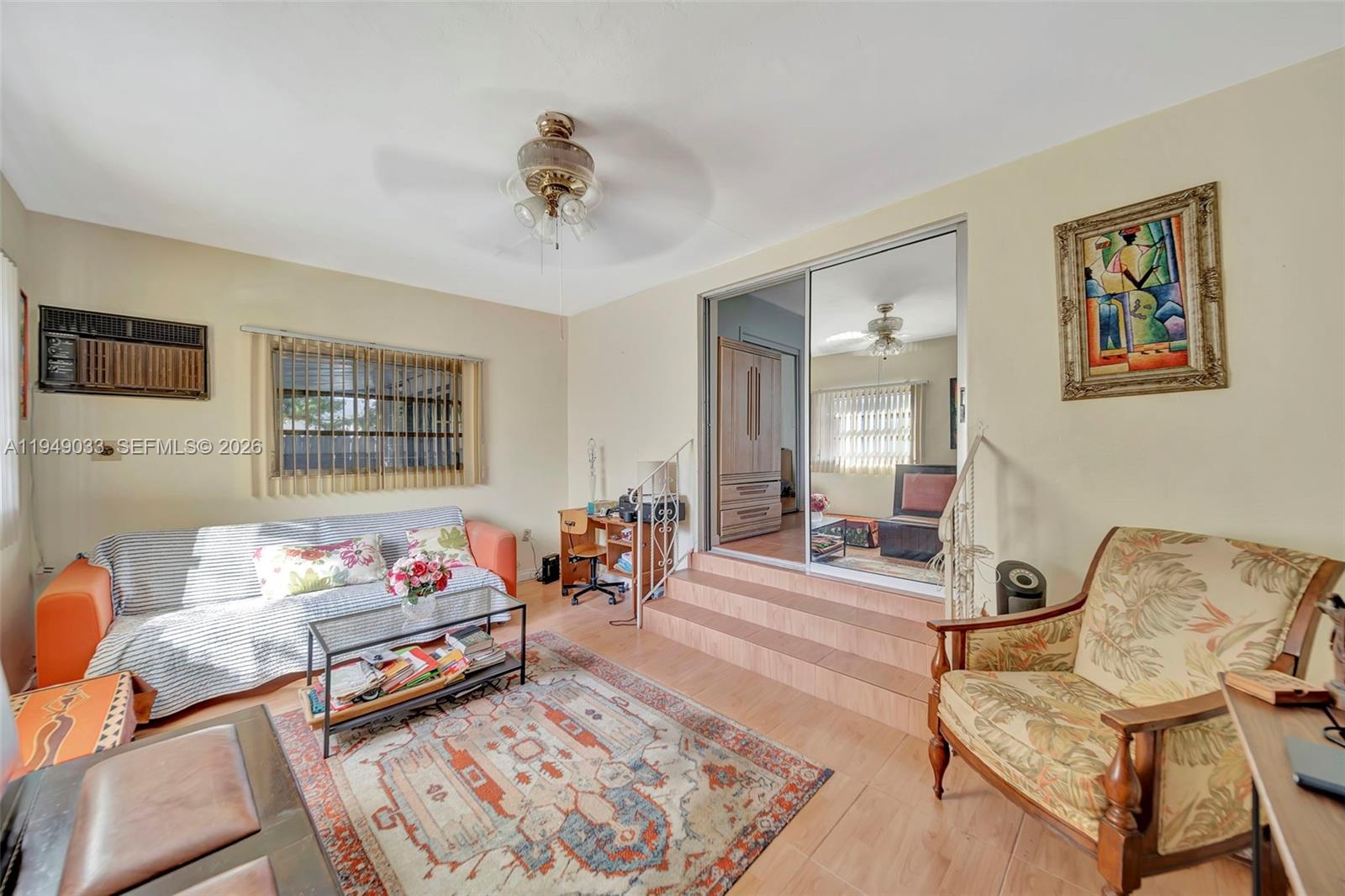 244 Northwest 43rd Street Miami, FL 33127 - Photo 16 of 29 a living room with furniture and wooden floor