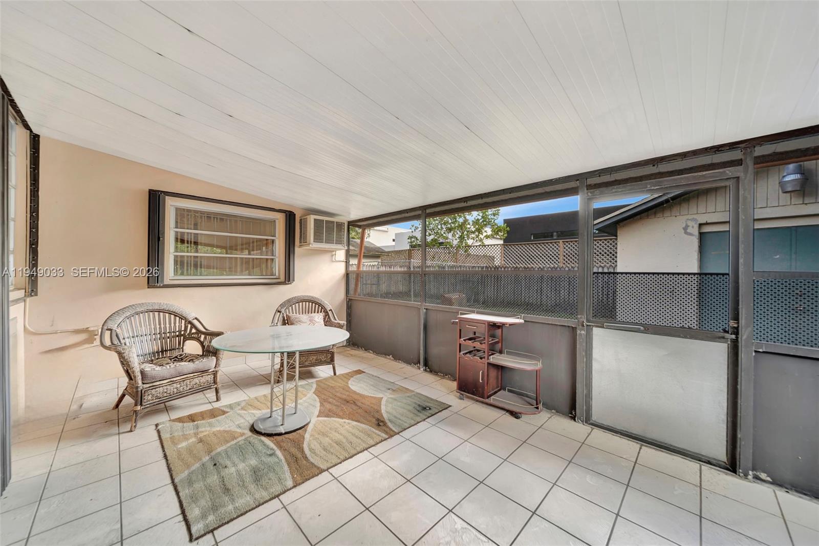 244 Northwest 43rd Street Miami, FL 33127 - Photo 21 of 29 a living room with furniture