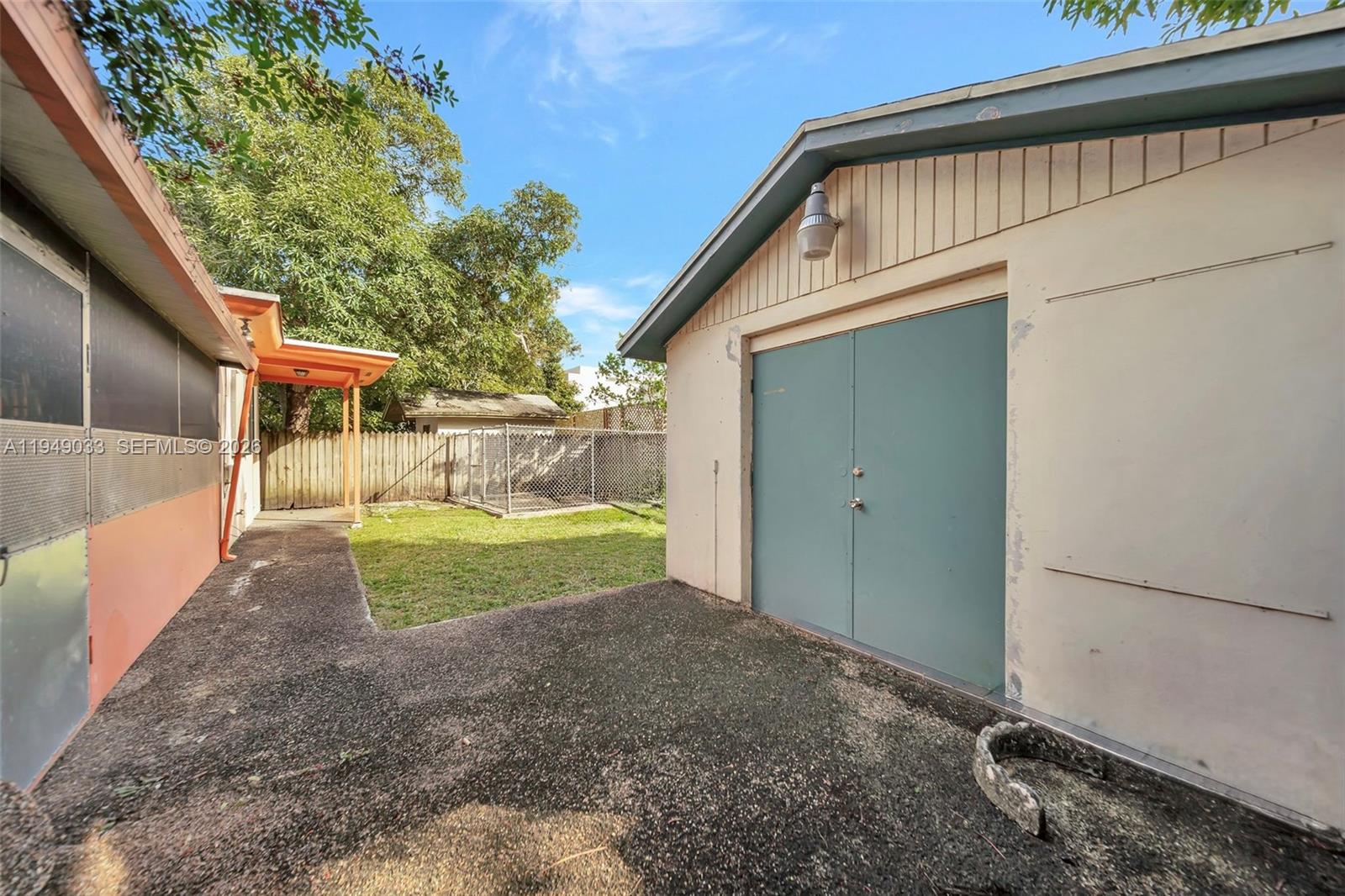 244 Northwest 43rd Street Miami, FL 33127 - Photo 23 of 29 a view of a house with a backyard