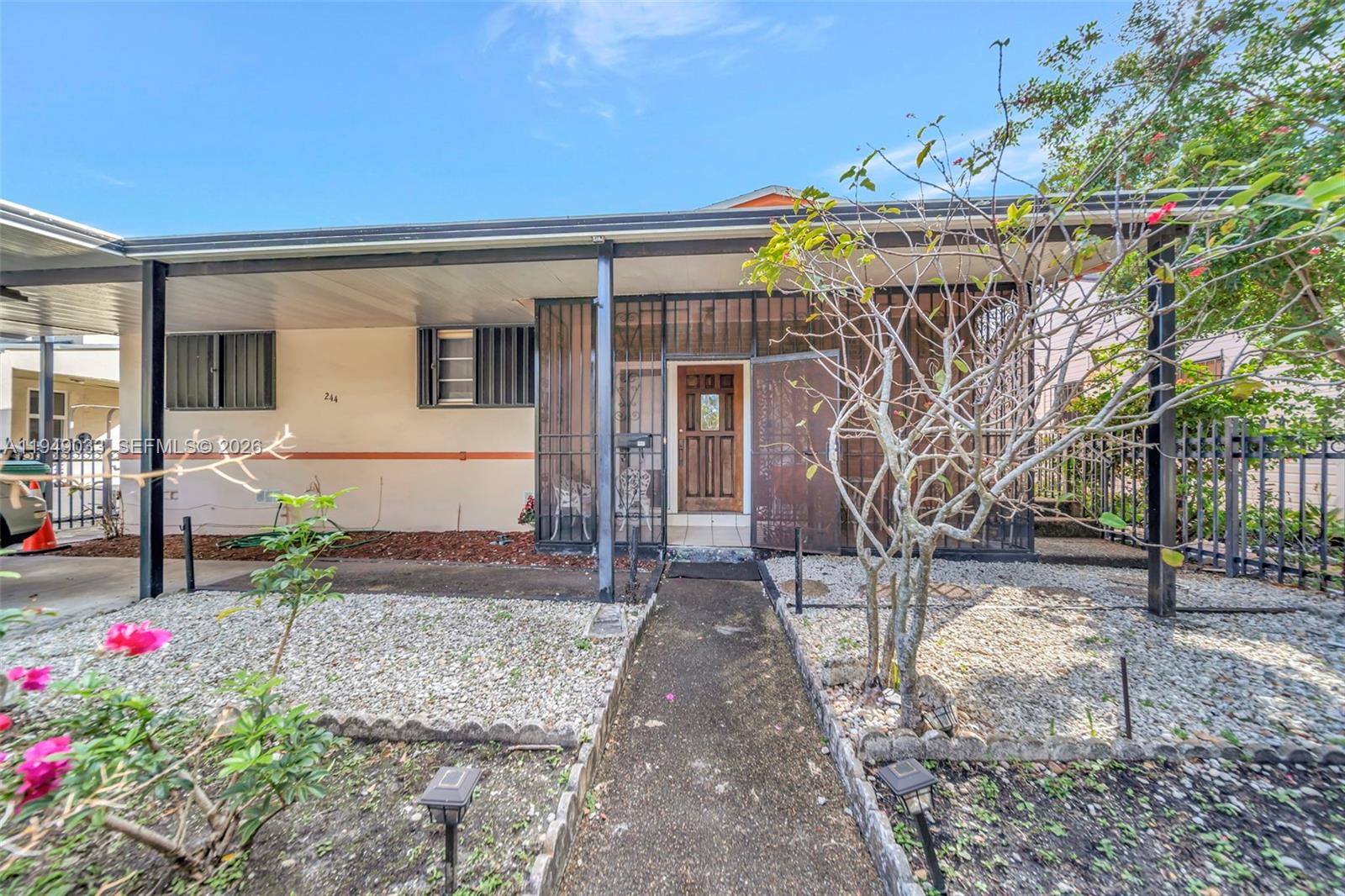 244 Northwest 43rd Street Miami, FL 33127 - Photo 27 of 29 a front view of a house with plants