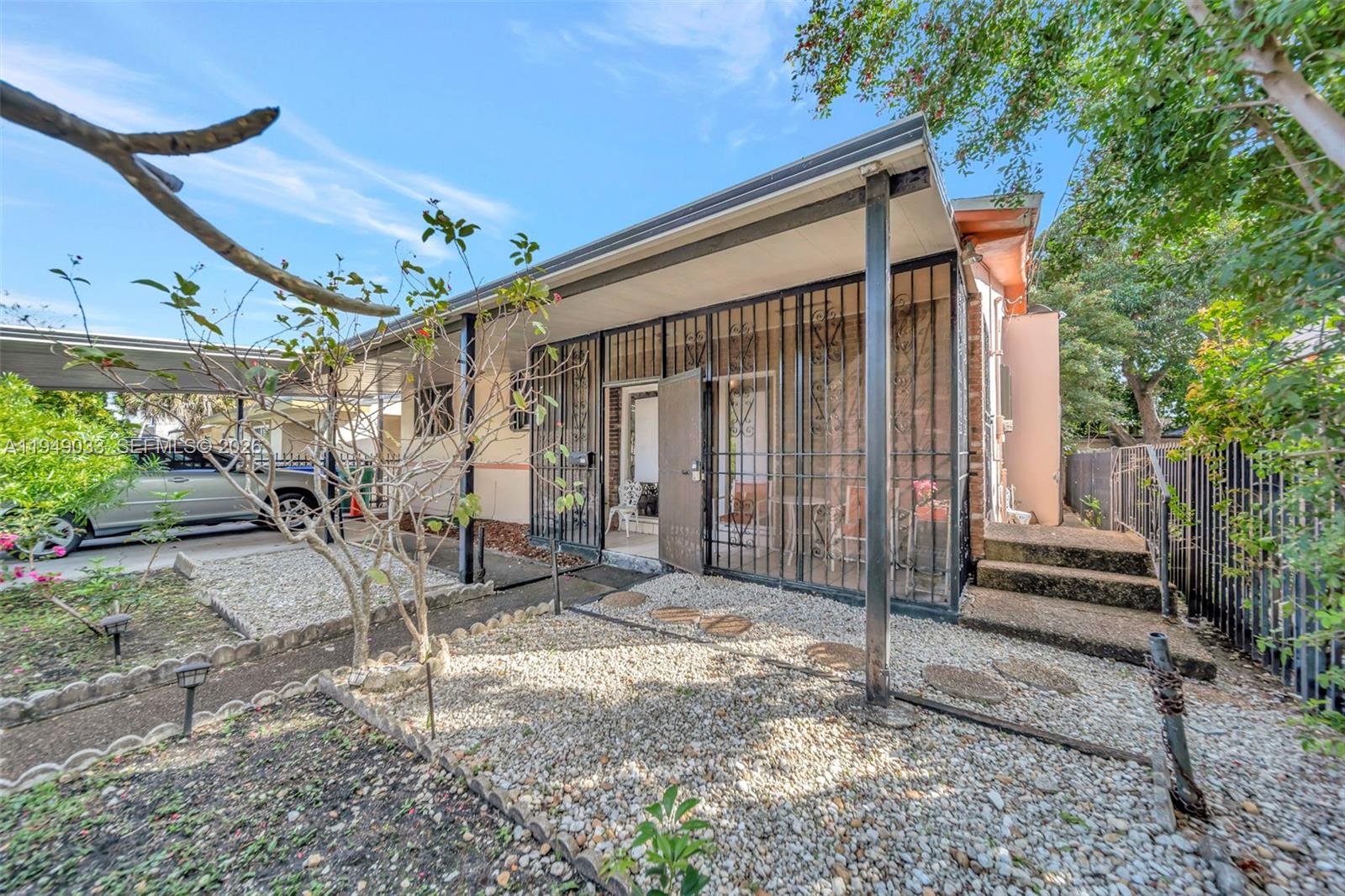 244 Northwest 43rd Street Miami, FL 33127 - Photo 29 of 29 a view of a house with a yard