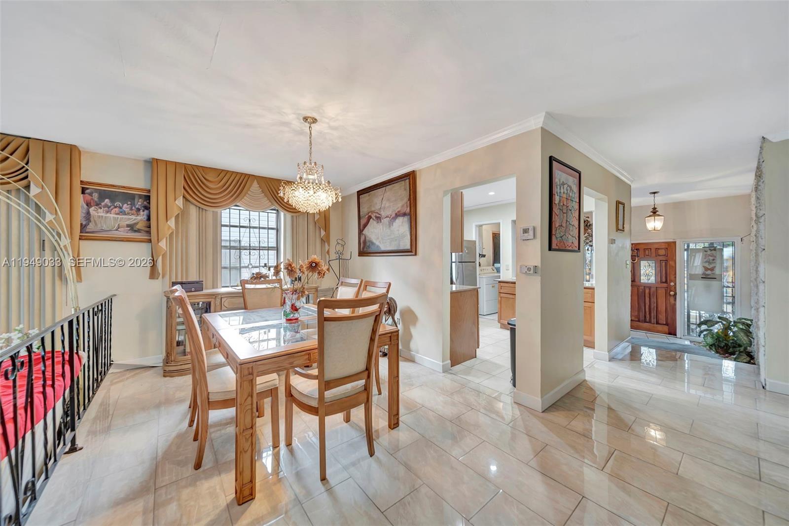 244 Northwest 43rd Street Miami, FL 33127 - Photo 8 of 29 a view of a a dining room with furniture window and wooden floor