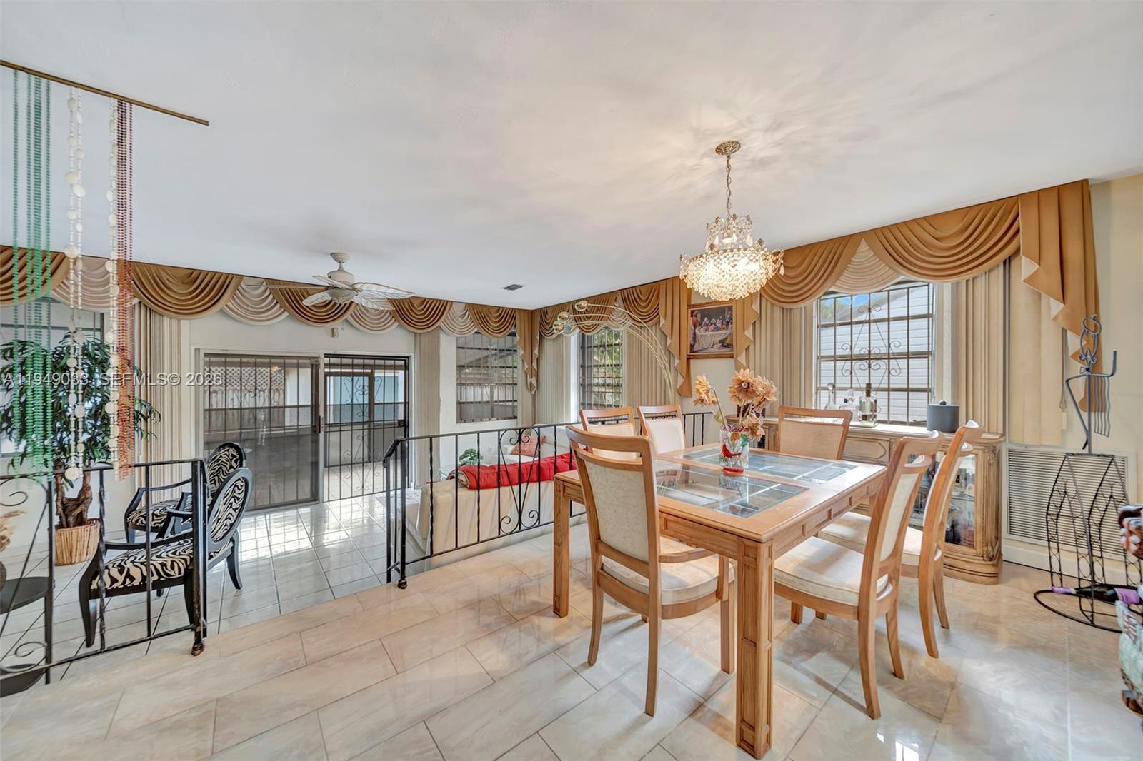 244 Northwest 43rd Street Miami, FL 33127 - Photo 9 of 29 a dining room with furniture and window