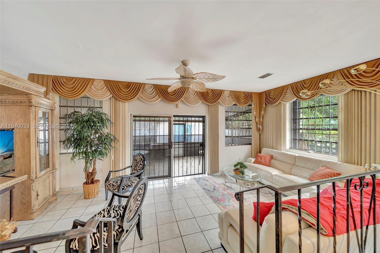 244 Northwest 43rd Street Miami, FL 33127 - Photo 10 of 29 a view of a dining room with furniture window and wooden floor