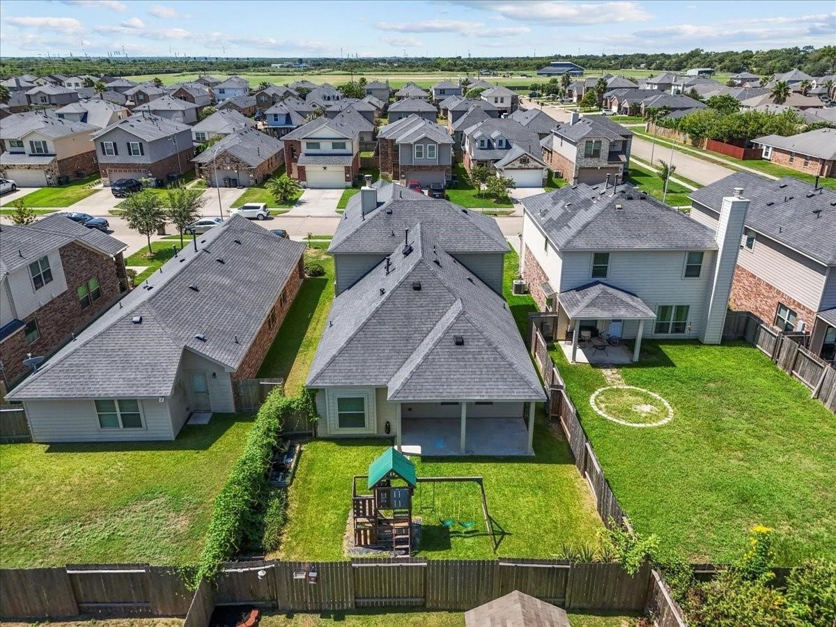 5111 Bay Lane Bacliff, TX 77518 - Photo 39 of 48 an aerial view of multiple houses with yard