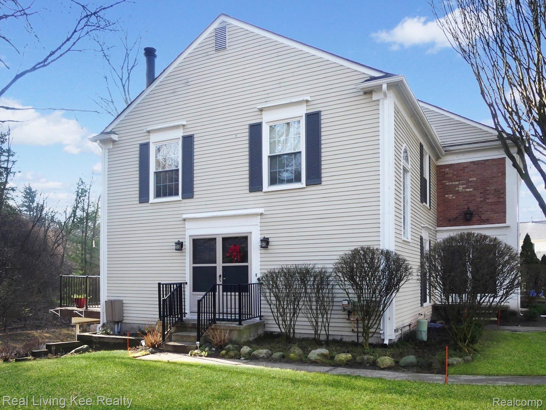 1326 Brook Lane Rochester, MI 48306 - Photo 1 of 47 End-unit condo with wooded view