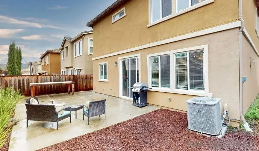 5517 Kennedy Place Rohnert Park, CA 94928 - Photo 14 of 15 a view of a patio with couches table and chairs and potted plants