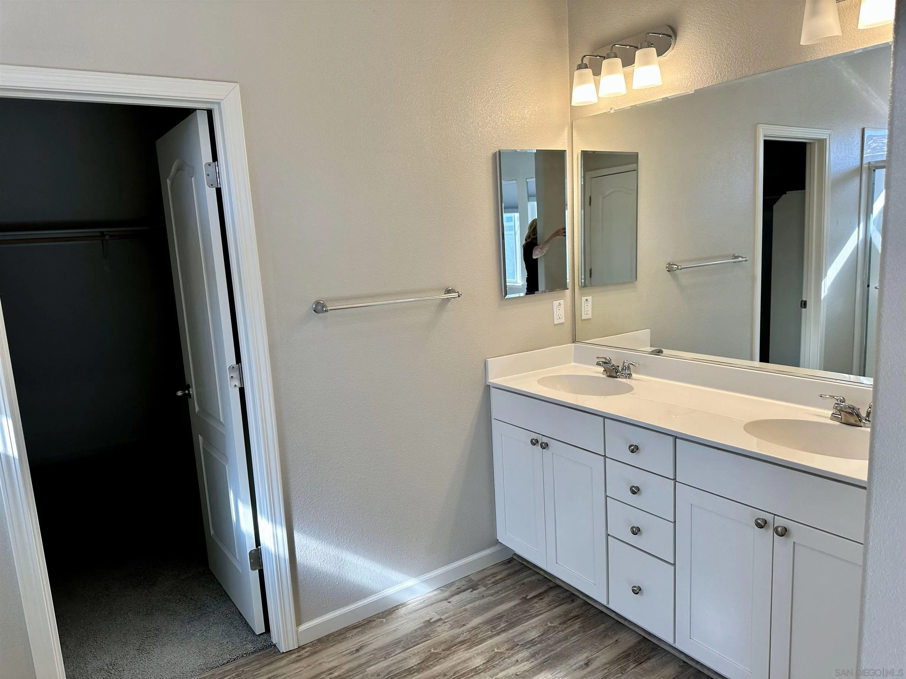 5517 Kennedy Place Rohnert Park, CA 94928 - Photo 9 of 15 a bathroom with a double vanity sink and mirror