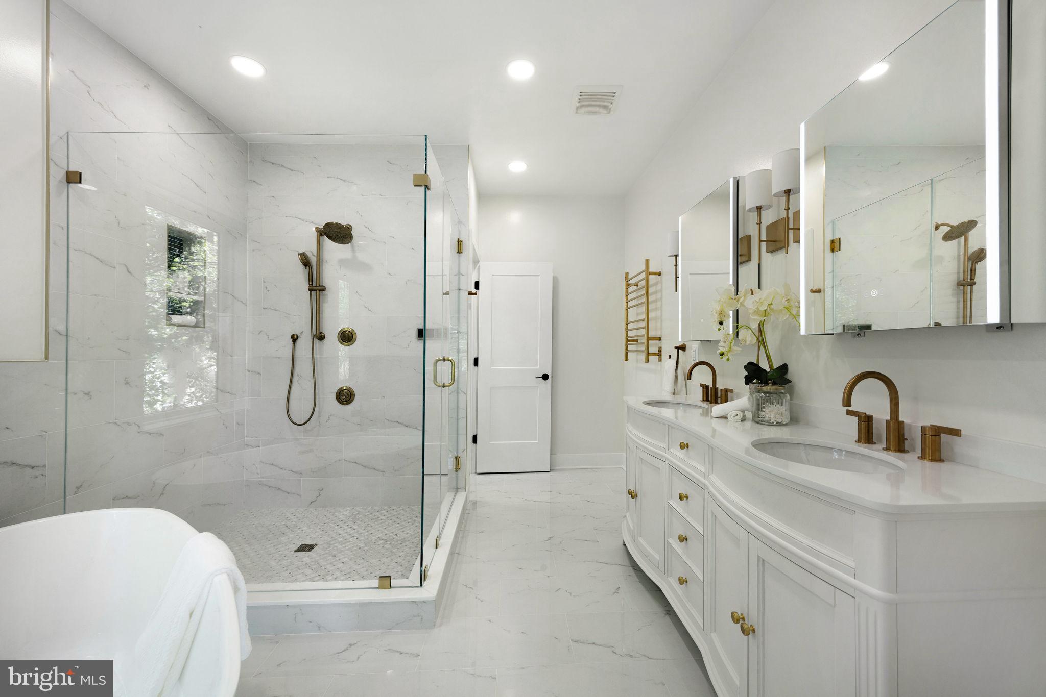 132 North Earley Street Alexandria, VA 22304 - Photo 19 of 45 a bathroom with a double vanity sink toilet and shower