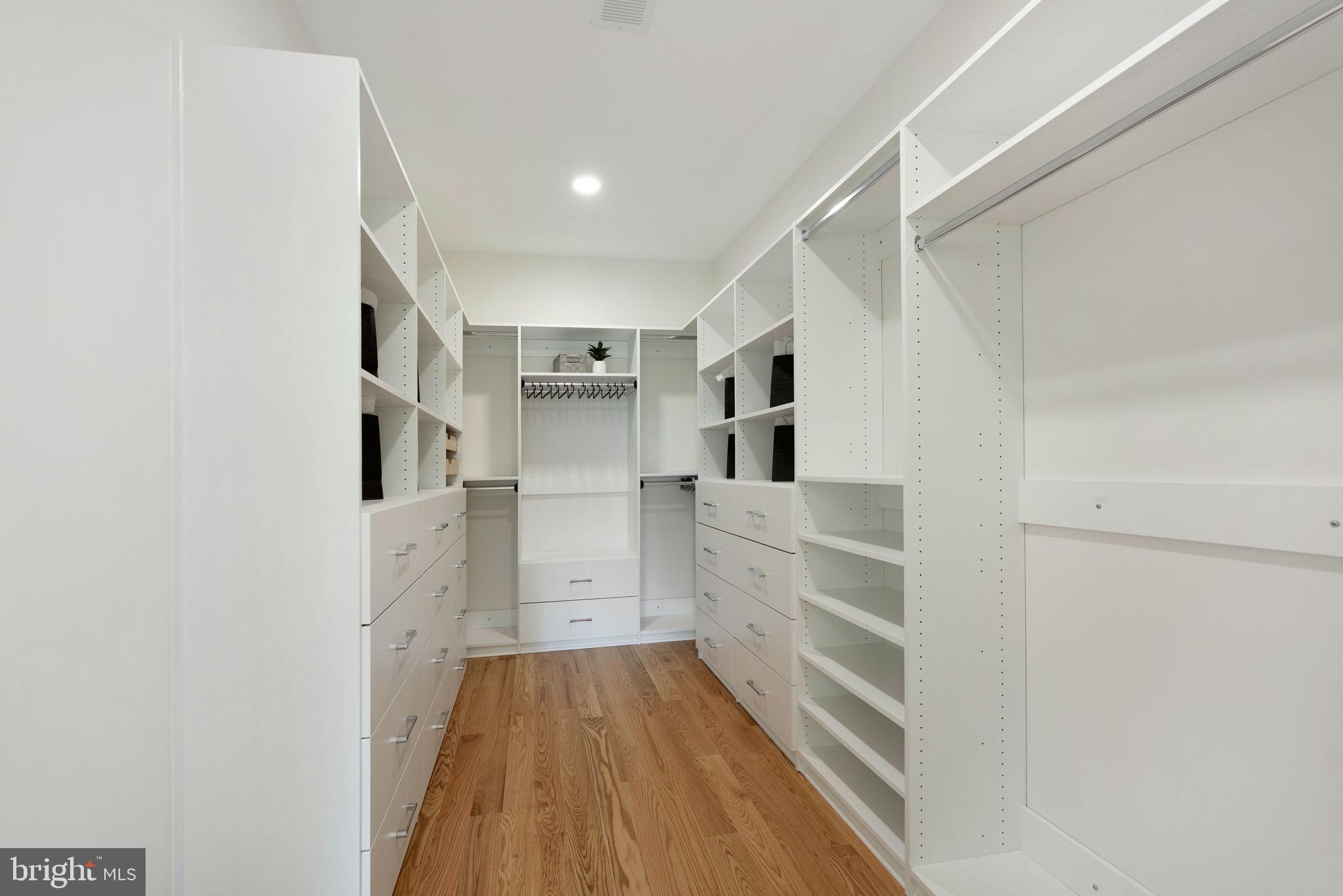 132 North Earley Street Alexandria, VA 22304 - Photo 20 of 44 a view of walk in closet with empty racks