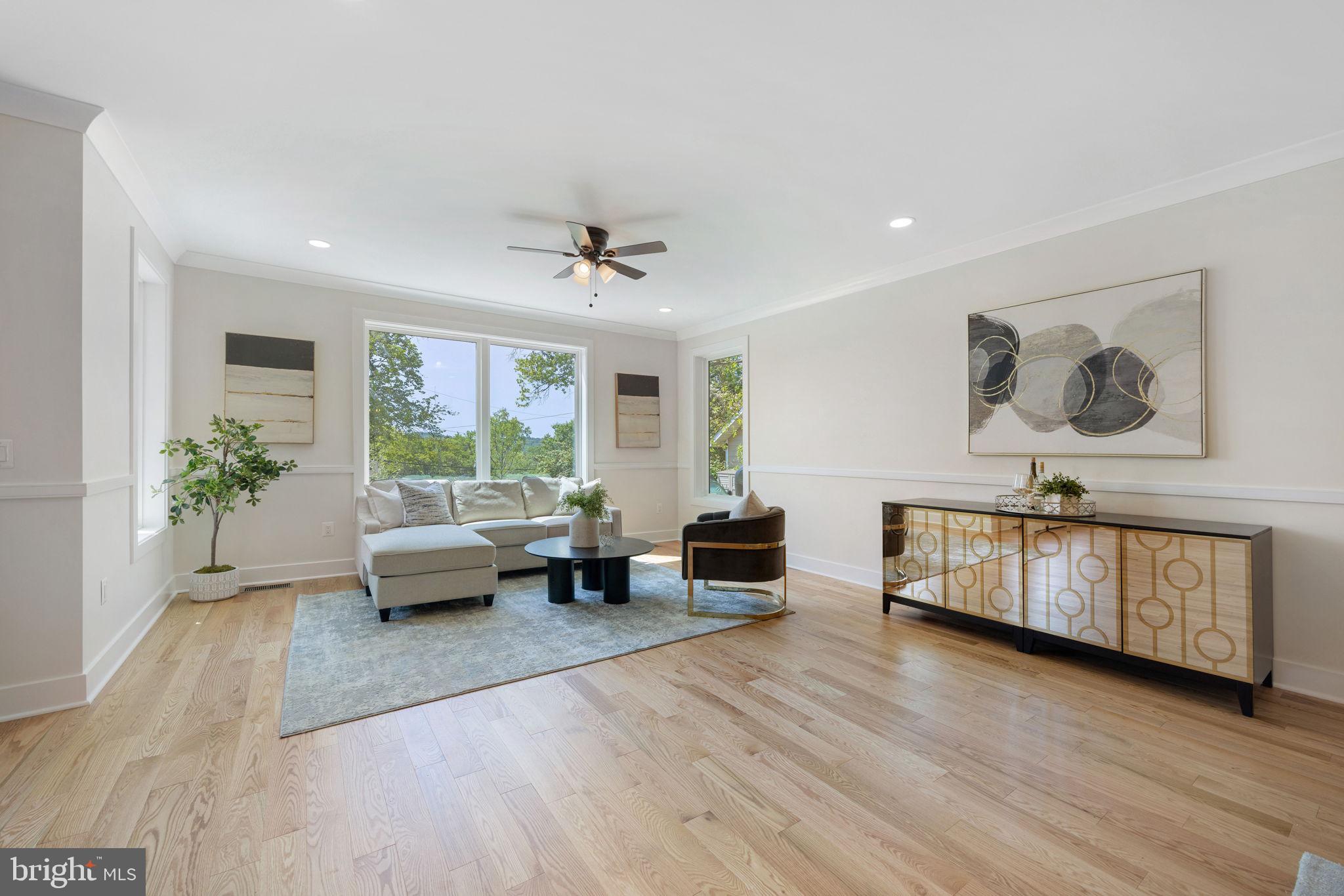 132 North Earley Street Alexandria, VA 22304 - Photo 6 of 44 a living room with furniture and a window
