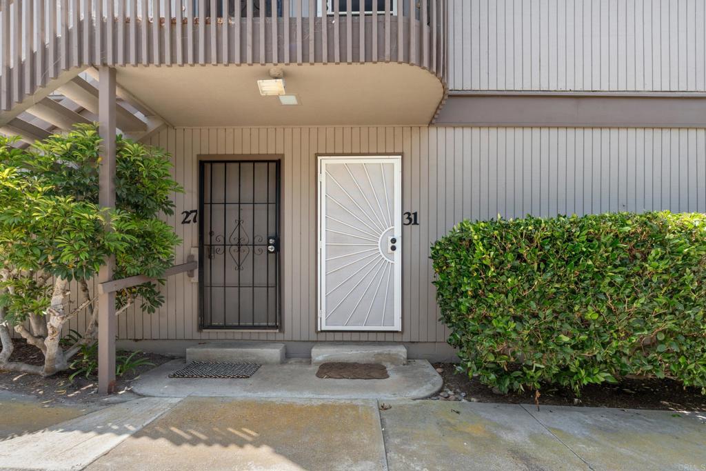 155 Rosebay Drive, Unit 31 Encinitas, CA 92024 - Photo 19 of 31 a front view of a house with garden