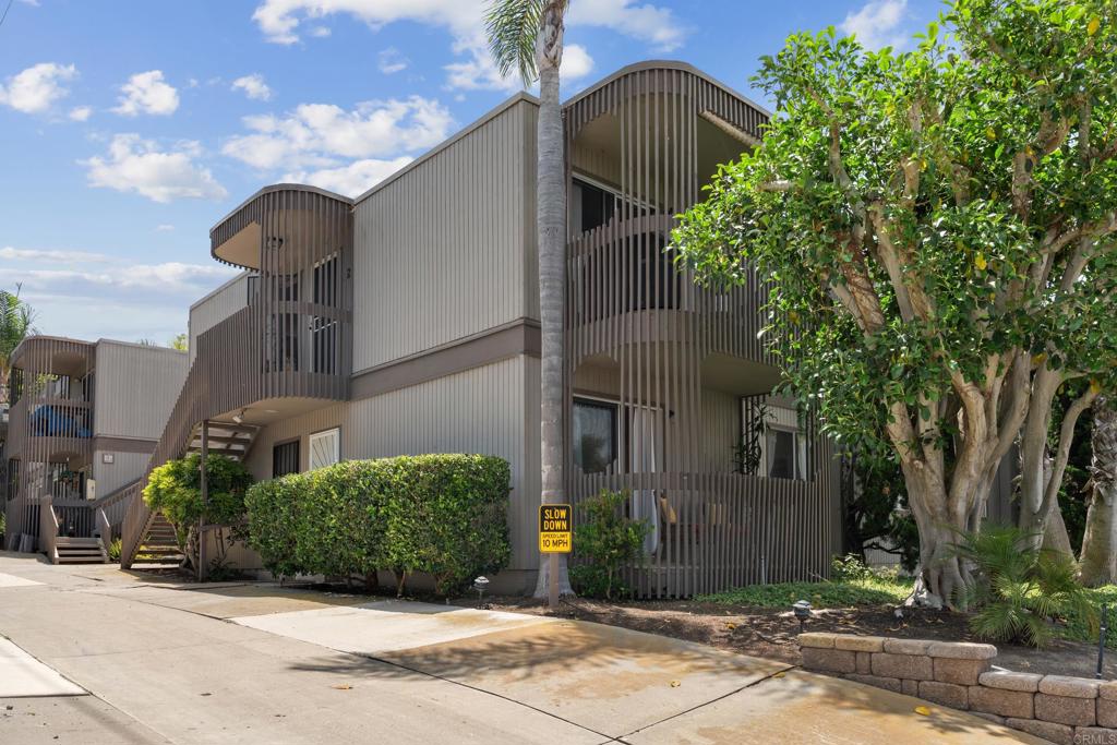 155 Rosebay Drive, Unit 31 Encinitas, CA 92024 - Photo 21 of 31 a front view of a house with garden