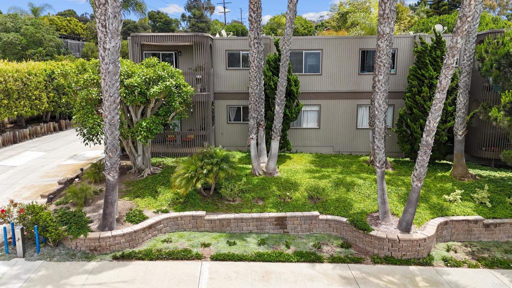 155 Rosebay Drive, Unit 31 Encinitas, CA 92024 - Photo 30 of 31 a view of a backyard with potted plants