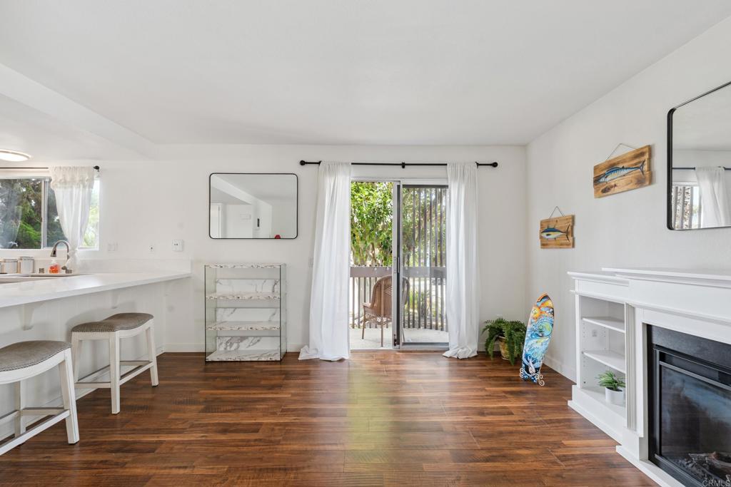 155 Rosebay Drive, Unit 31 Encinitas, CA 92024 - Photo 3 of 31 a view of a livingroom with furniture and a fireplace