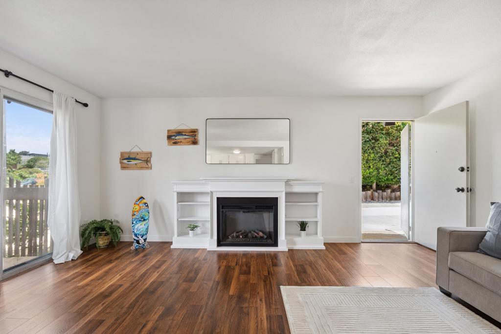 155 Rosebay Drive, Unit 31 Encinitas, CA 92024 - Photo 6 of 31 a living room with furniture and a fireplace