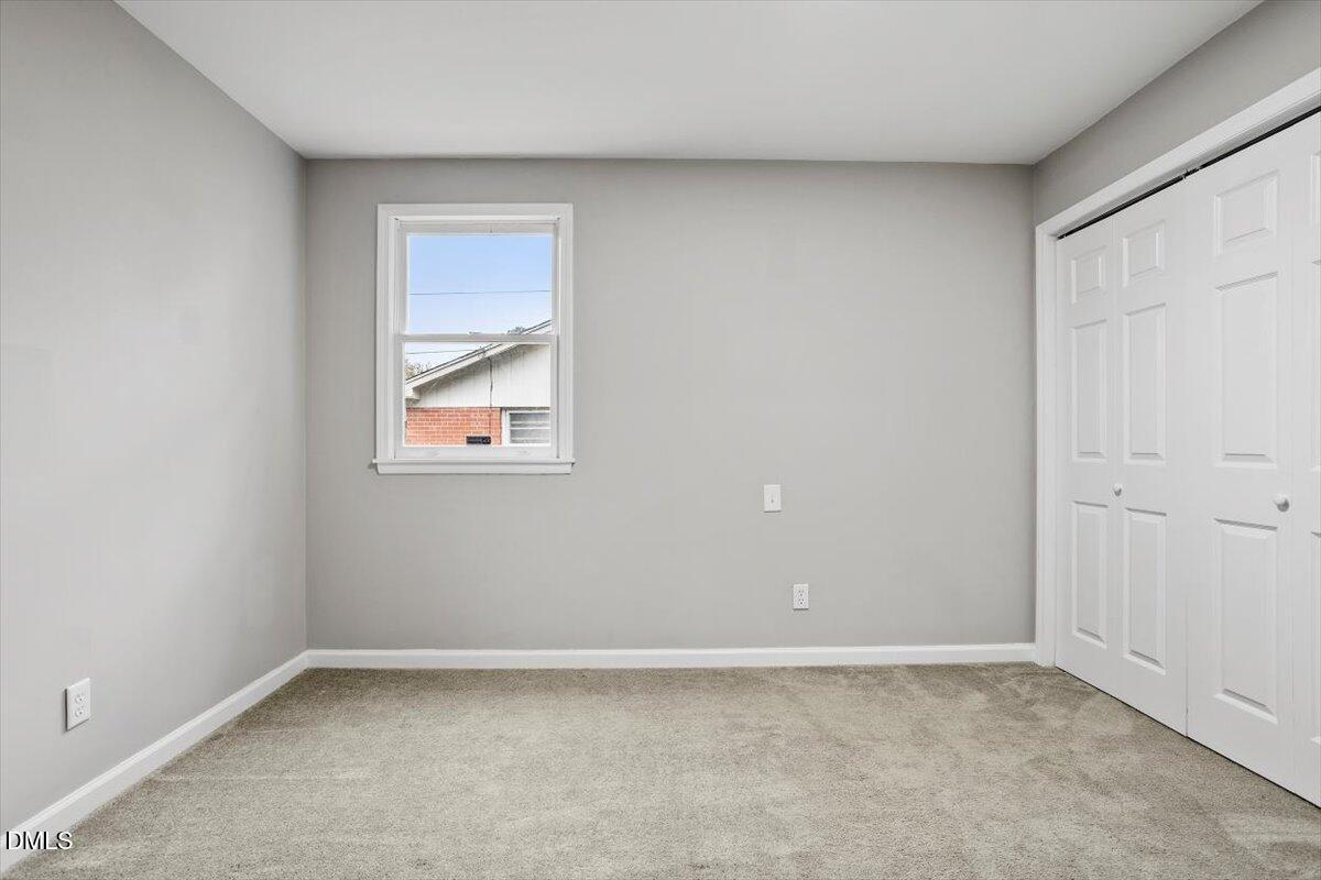 816 Peyton Street Raleigh, NC 27610 - Photo 17 of 29 an empty room with a window