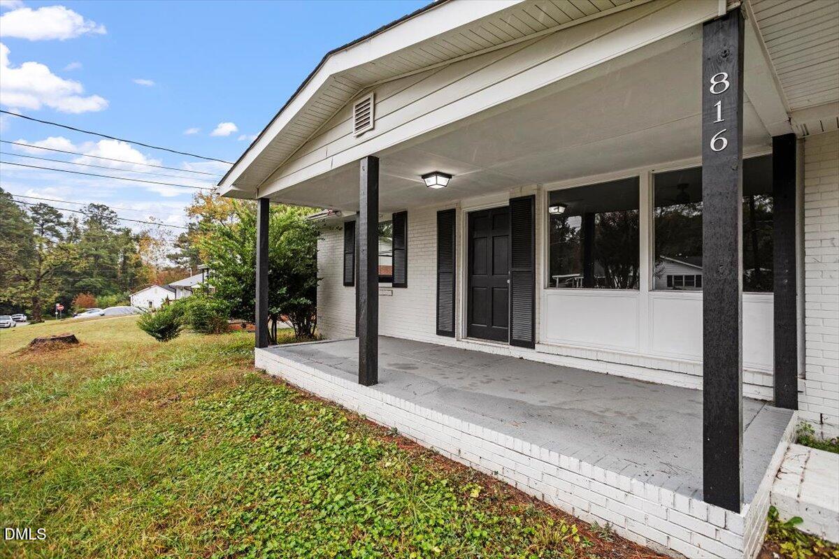 816 Peyton Street Raleigh, NC 27610 - Photo 2 of 29 a view of a entrance gate of the house