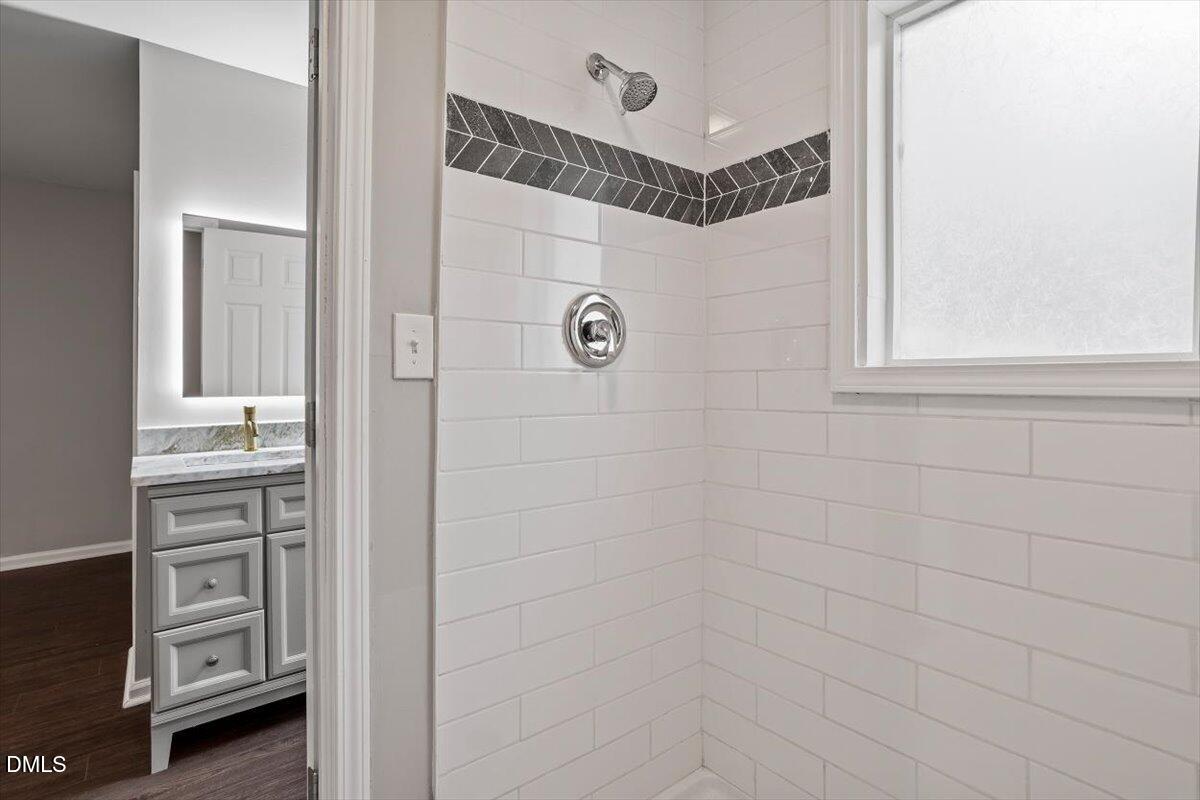 816 Peyton Street Raleigh, NC 27610 - Photo 23 of 29 a bathroom with a shower