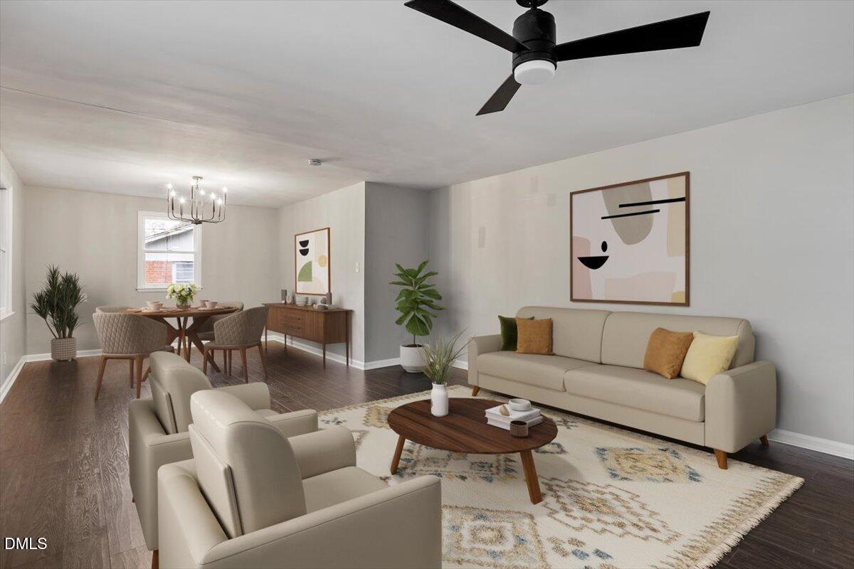 816 Peyton Street Raleigh, NC 27610 - Photo 6 of 29 a living room with furniture and wooden floor