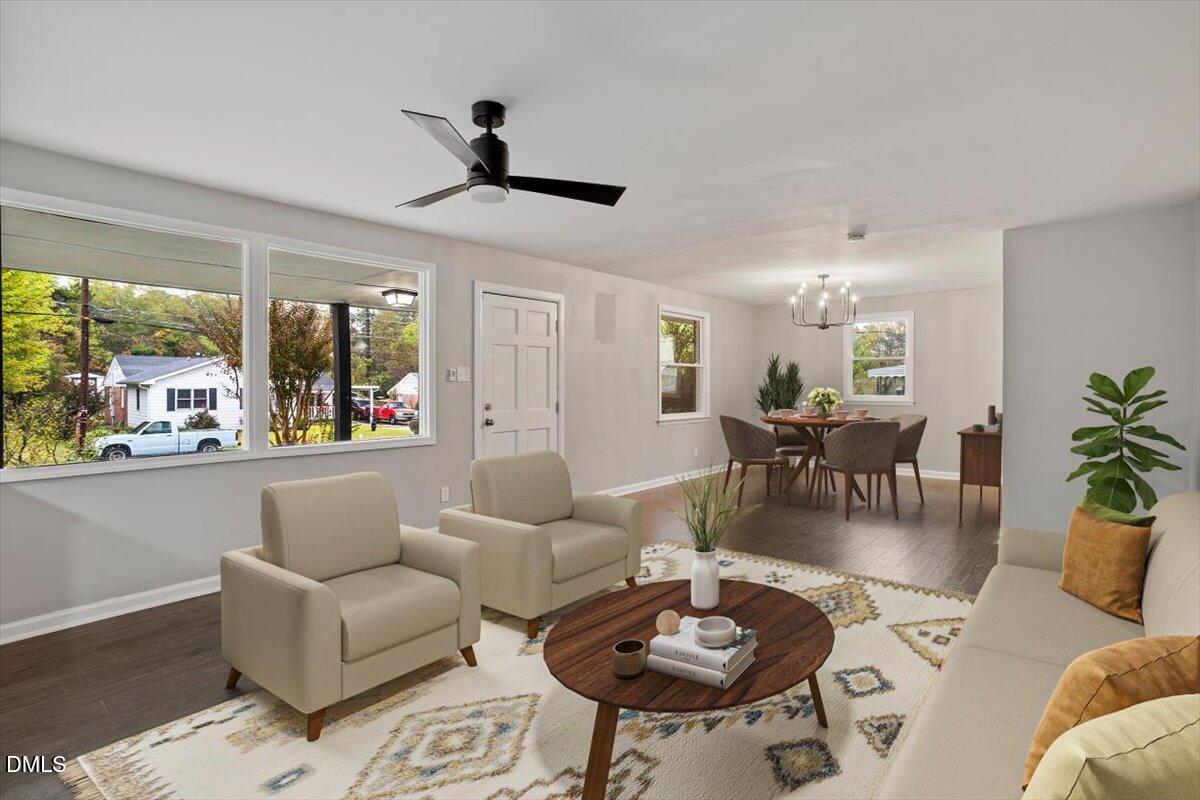 816 Peyton Street Raleigh, NC 27610 - Photo 8 of 29 a living room with furniture and a large window