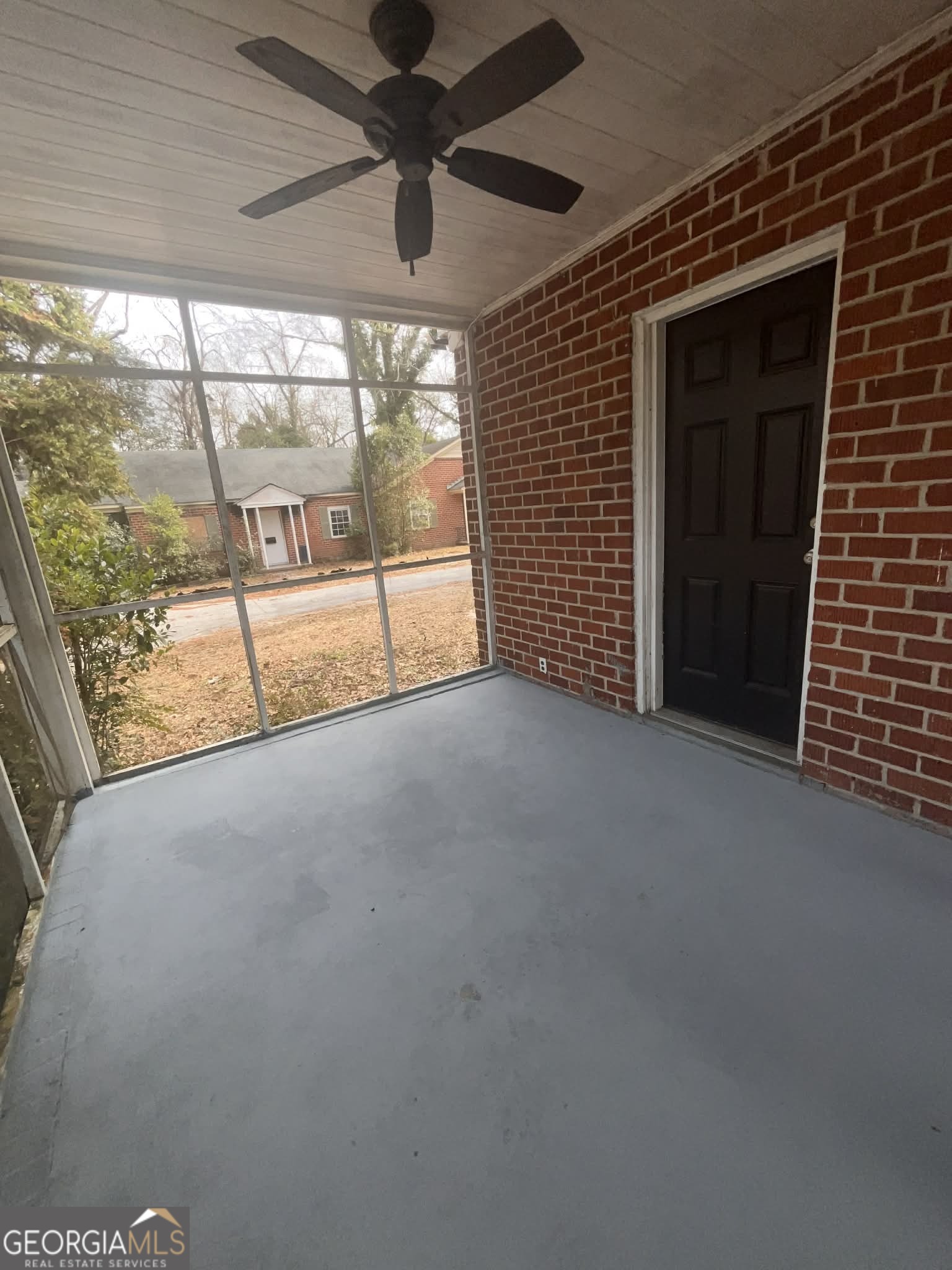 1067 Boulevard Macon, GA 31211 - Photo 7 of 7 a view of a livingroom with a ceiling fan and window