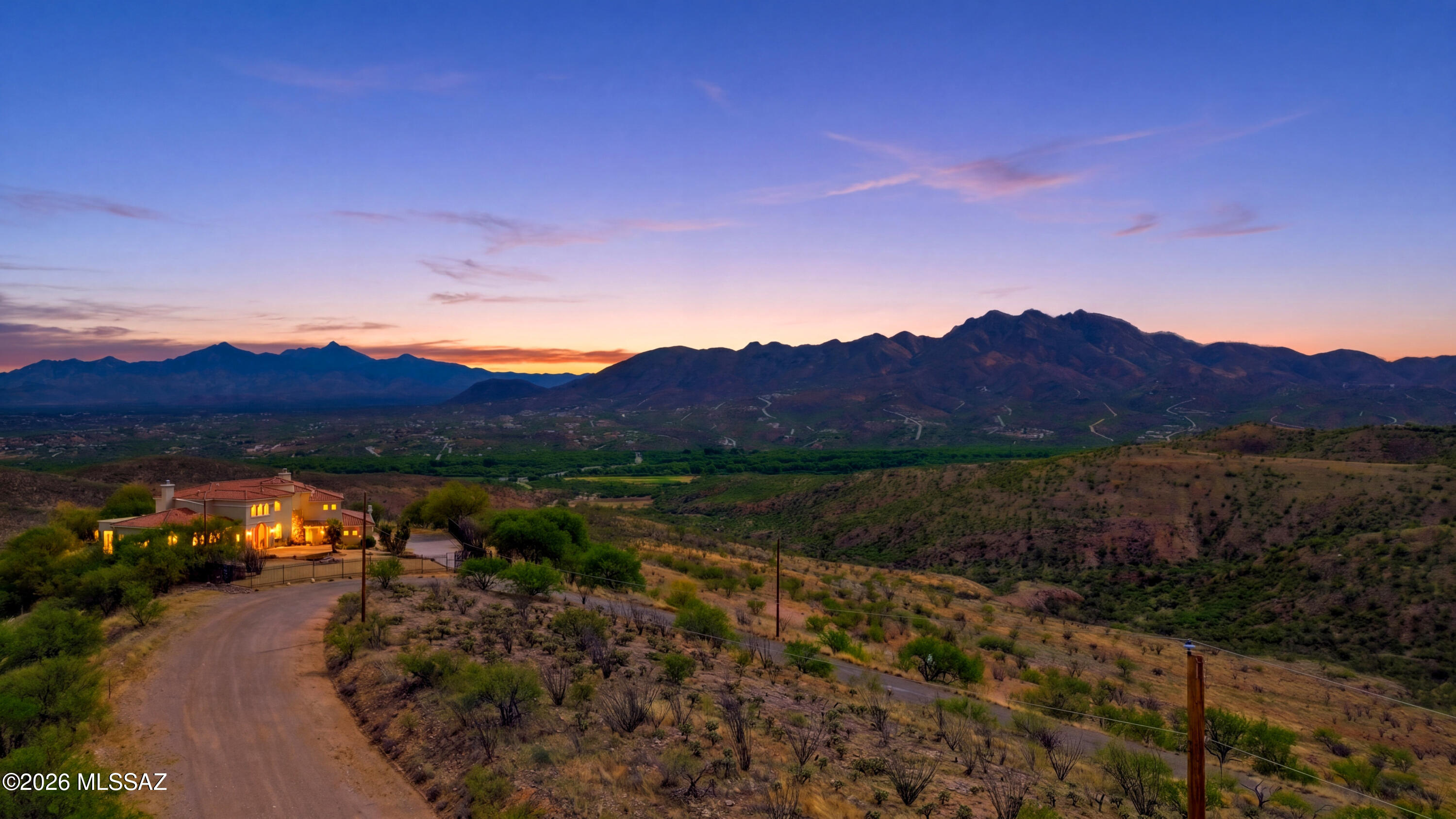 1525 Circulo Jacona, Unit 32 Rio Rico, AZ 85648 - Photo 1 of 13 a view of lake and mountain