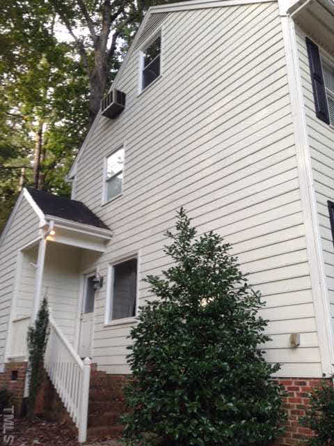 4313 Old Colony Road Raleigh, NC 27613 - Photo 3 of 3 a front view of a house with trees