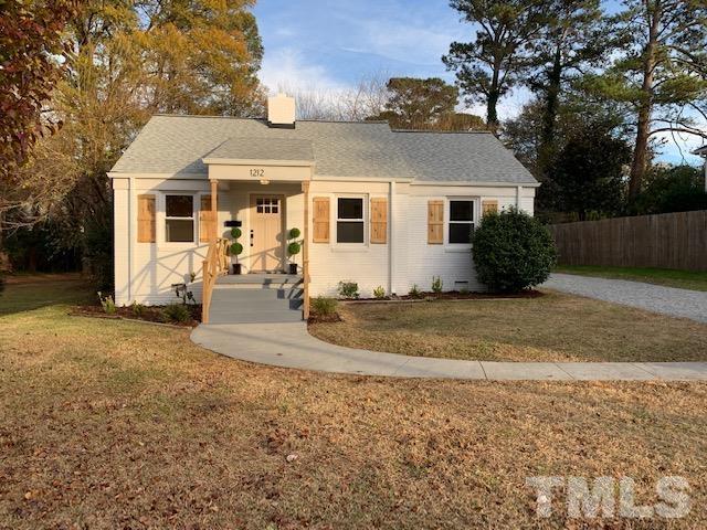 1212 Watauga Street Raleigh, NC 27604 - Photo 1 of 33 a view of a house with a yard