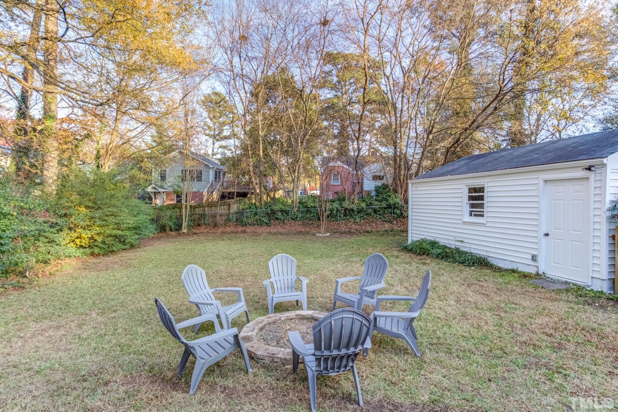 1212 Watauga Street Raleigh, NC 27604 - Photo 33 of 33 a view of a chairs and table in patio