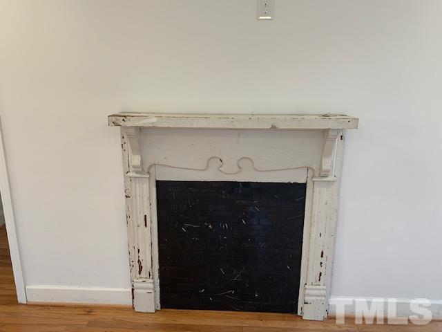 1212 Watauga Street Raleigh, NC 27604 - Photo 6 of 33 a close view of a fireplace