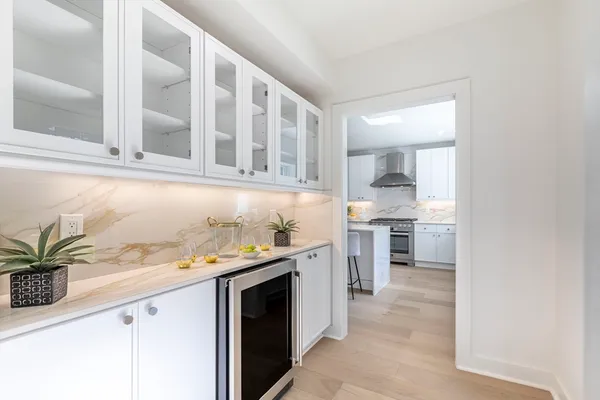 a kitchen with a sink and cabinets