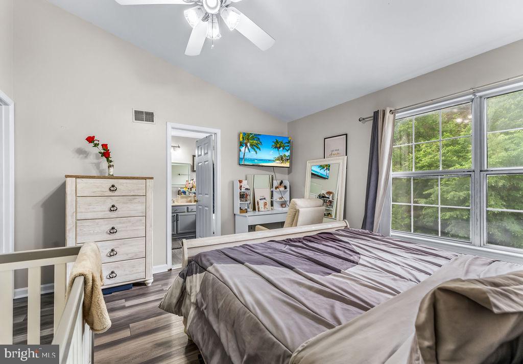 11409 Hermosa Drive Laurel, MD 20708 - Photo 16 of 28 a bedroom with a bed and a window