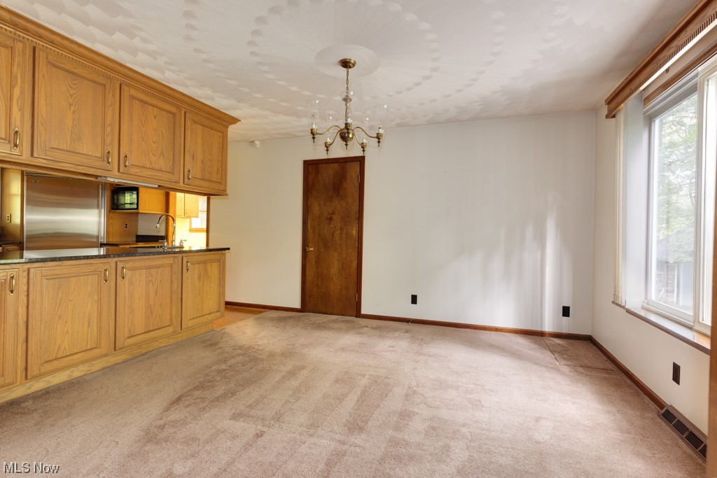 4616 Alliance Road Ravenna, OH 44266 - Photo 7 of 28 Dining Room opens to kitchen