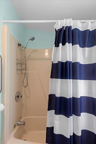 a view of a storage & utility room with washer and dryer